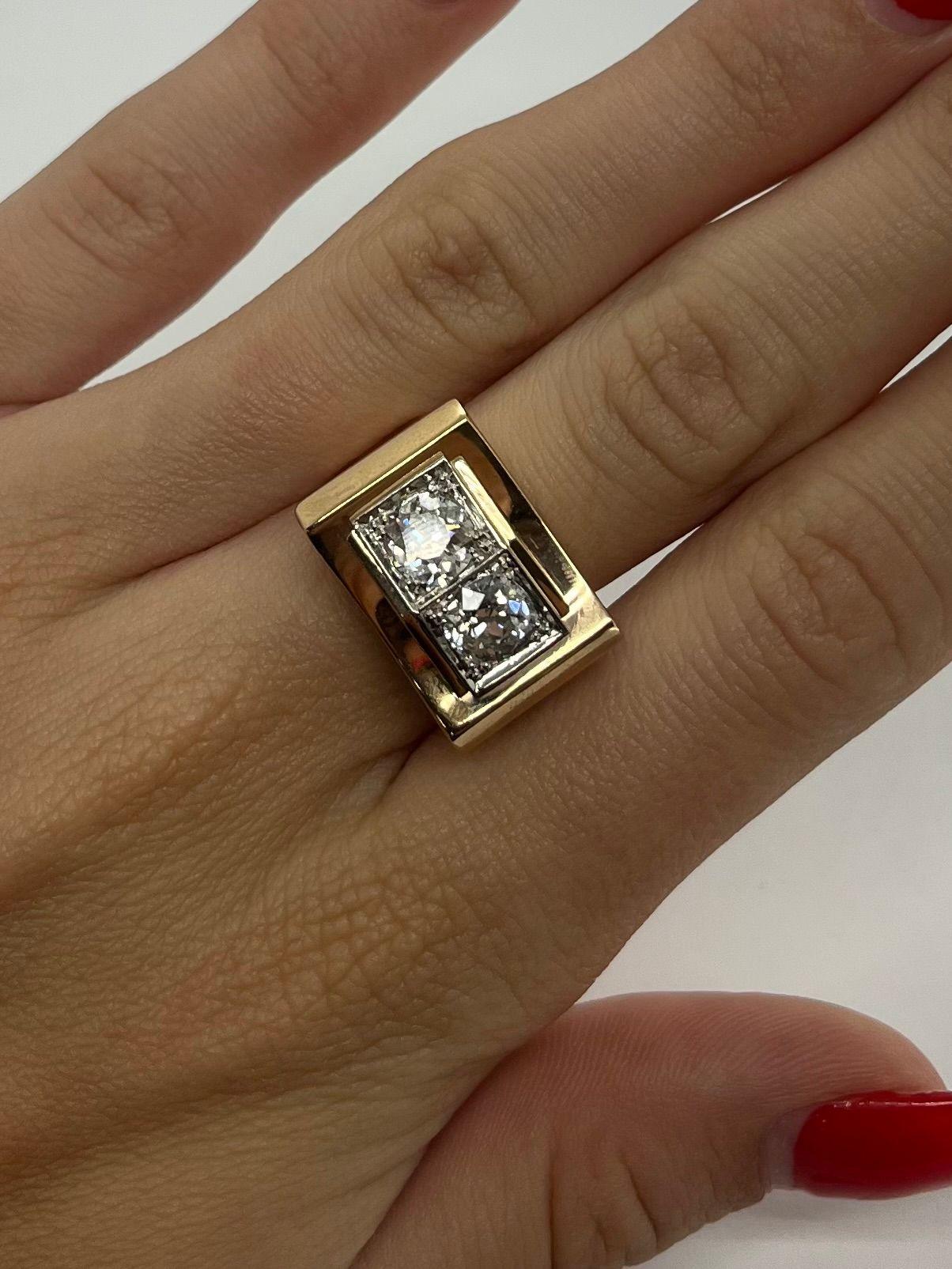 This vintage Tank-style ring is crafted in solid 18K rose gold (750/1000) and showcases bold design with timeless elegance. It features two stunning old-cut natural diamonds, each weighing approximately 0.90 carat, for a total diamond weight of 1.80