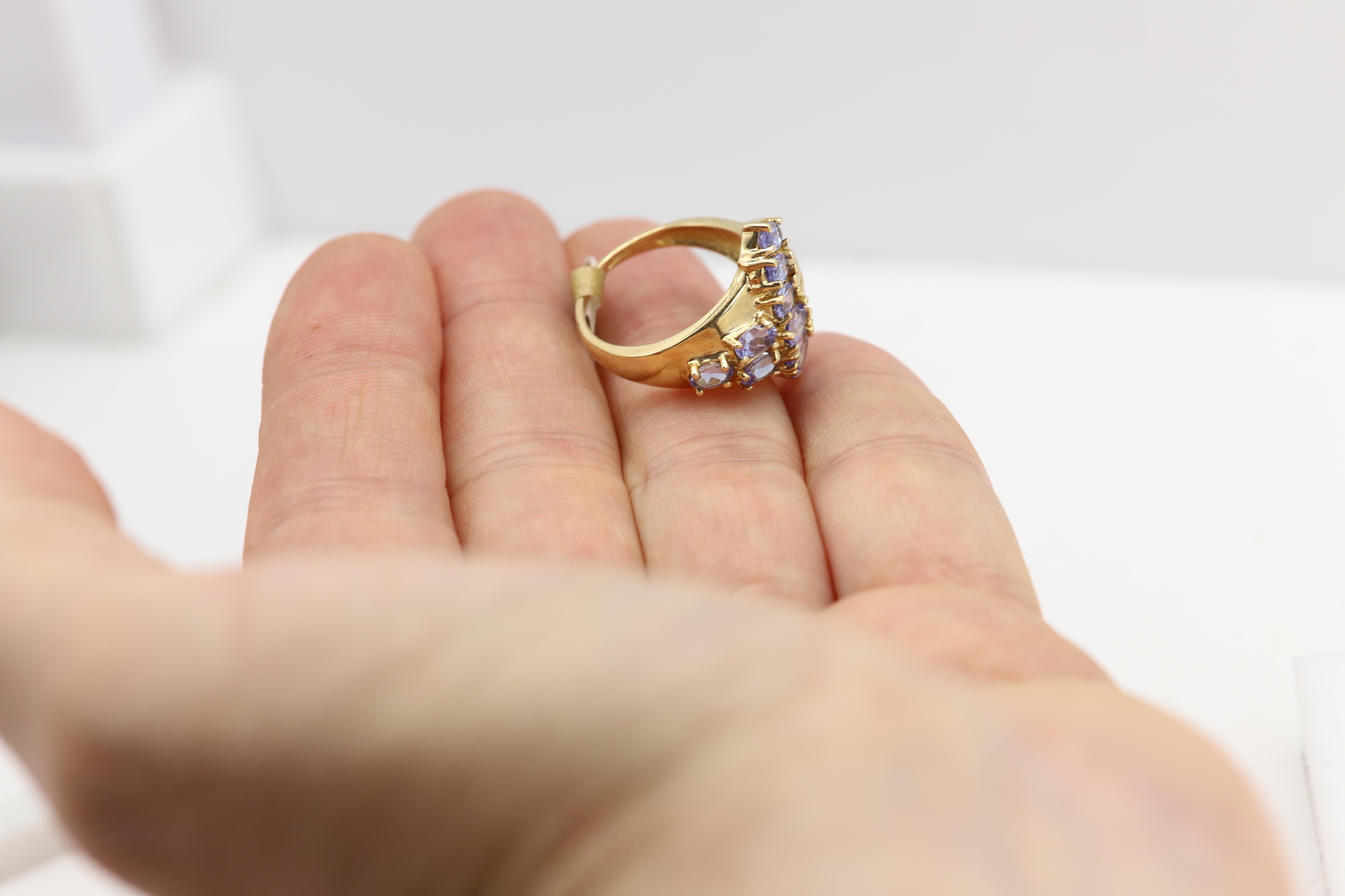Oval Cut Vintage Tanzanite Cluster Designer Ring 10 Karat Yellow Gold For Sale