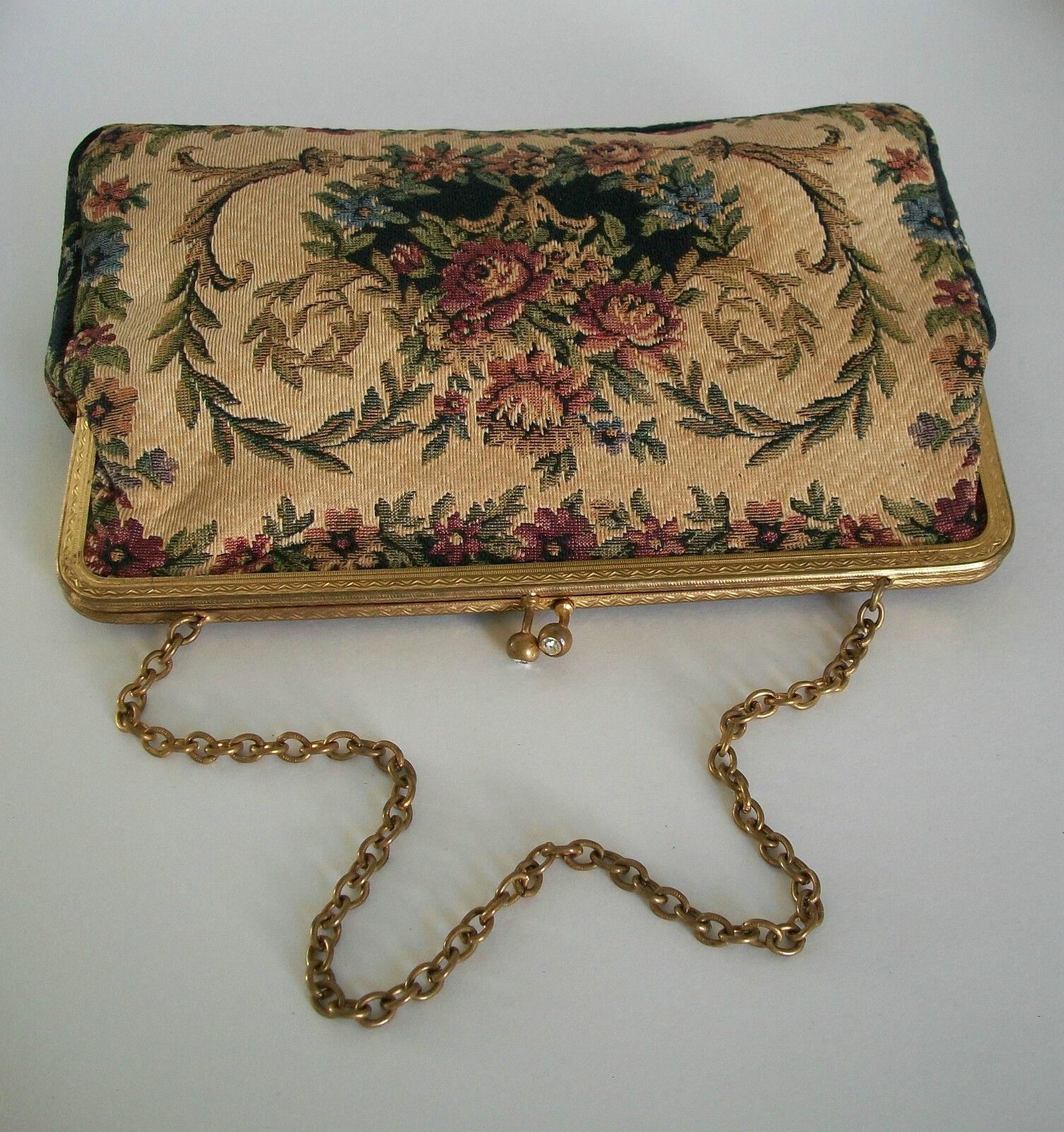 Vintage floral tapestry evening bag - small size  - fine detail to the machine made tapestry - rhinestone closure with gilt metal frame and chain link strap - original lining - unsigned - country of origin unknown - circa 1950's.

Good vintage