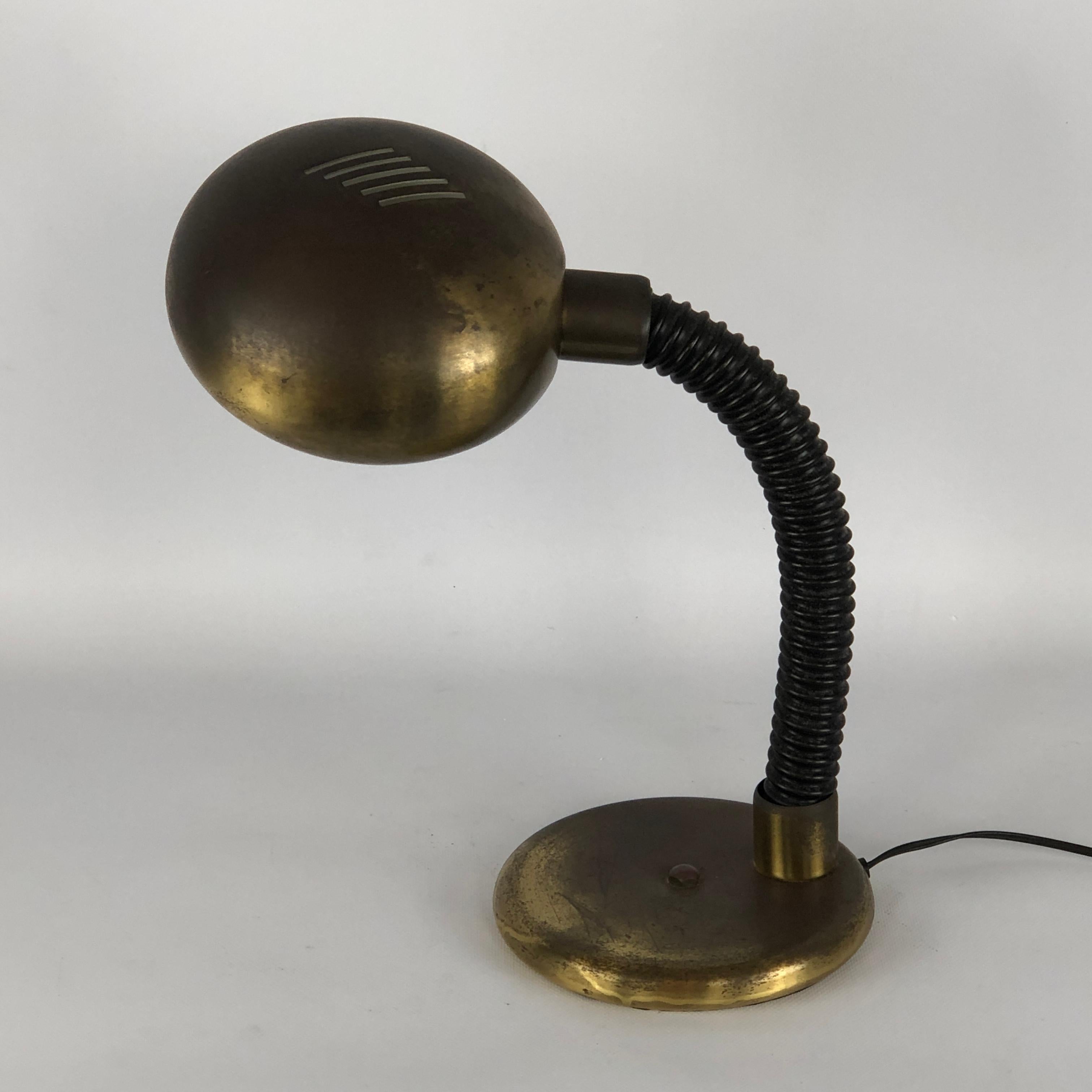 Original vintage condition with heavy trace of age and use on the metal for this Targetti table lamp from 70s. Full working with EU standard, adaptable on demand for USA standard.
 