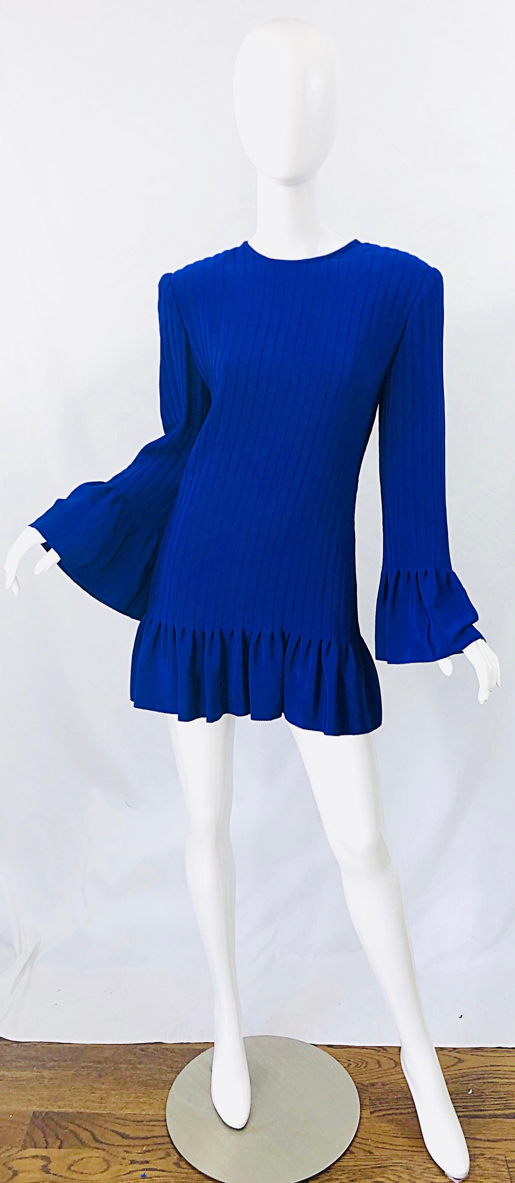 Chic early 1980s TARQUIN EBKER royal blue silk pleated mini dress or tunic top ! Ebker was a high society designer throughout the 60s, 70s, 80s and 90s. His work was known to be couture quality, with heavy attention to details. Hidden zipper up the