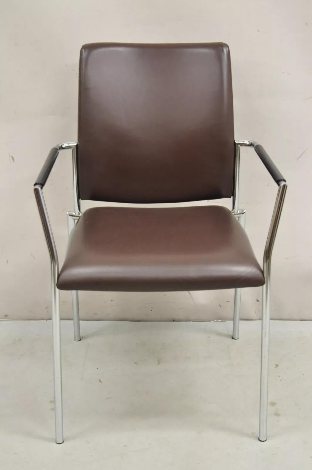 Vintage Tayco Canada Sleek Chrome and Chocolate Brown Vinyl Arm Chairs - Set of 4. Circa Late 20th Century. Measurements: 36