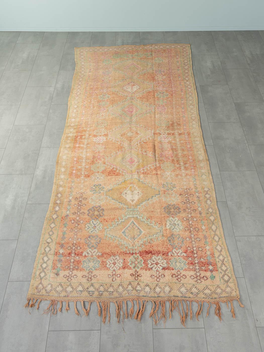 This Vintage Taznakht is a 100 % wool rug – soft and comfortable underfoot. Our Berber rugs are handmade, one knot at a time. Each of our Berber rugs is a long-lasting one-of-a-kind piece, created in a sustainable manner with local wool. 

Vintage