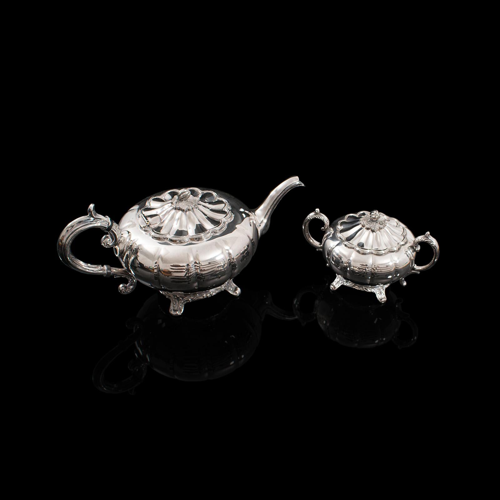 This is a quality vintage tea service. An English, silver plated teapot and dish by Viners of Sheffield, dating to the mid-20th century, circa 1960.

Two attractive pieces for a relaxing afternoon
Displays a desirable aged patina with minimal