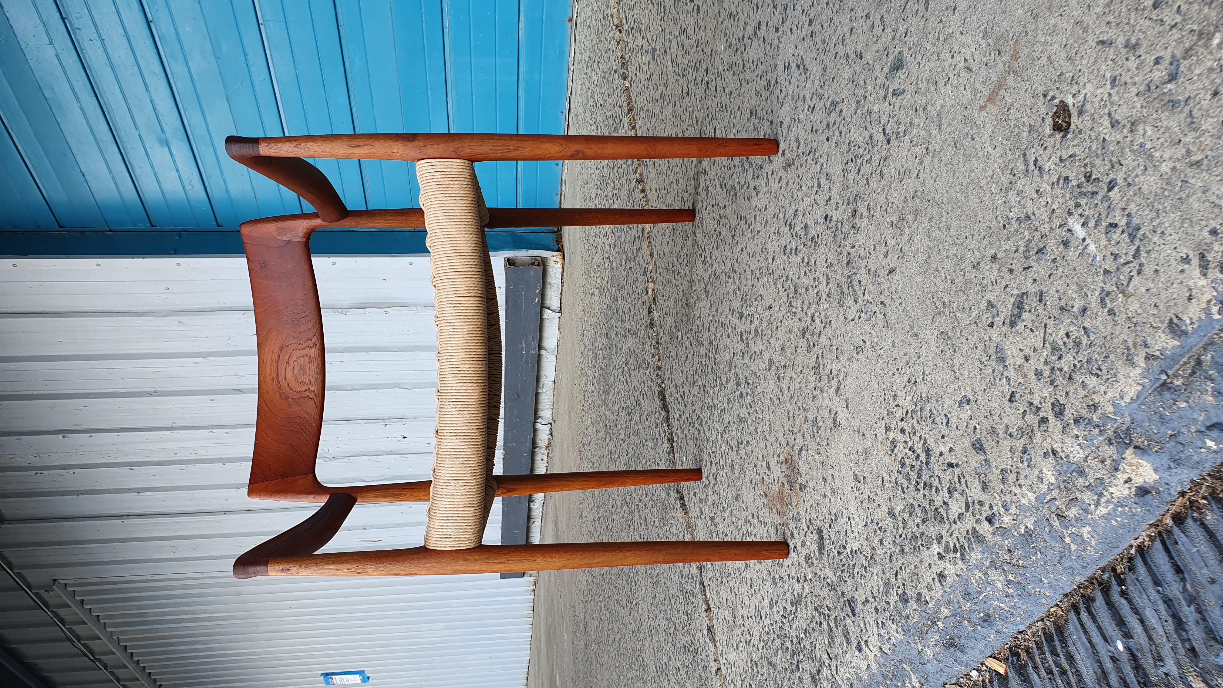 Beautiful refinished teak arm chair with new danish cord. Model 57 teak arm chair by niels moller for jl mollerfabrik. this chair has great ones and would work great at the dining table, as a desk chair or accent chair.