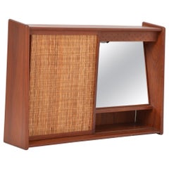 Danish Mid-Century Modern Teak bathroom cabinet with sliding door and mirror