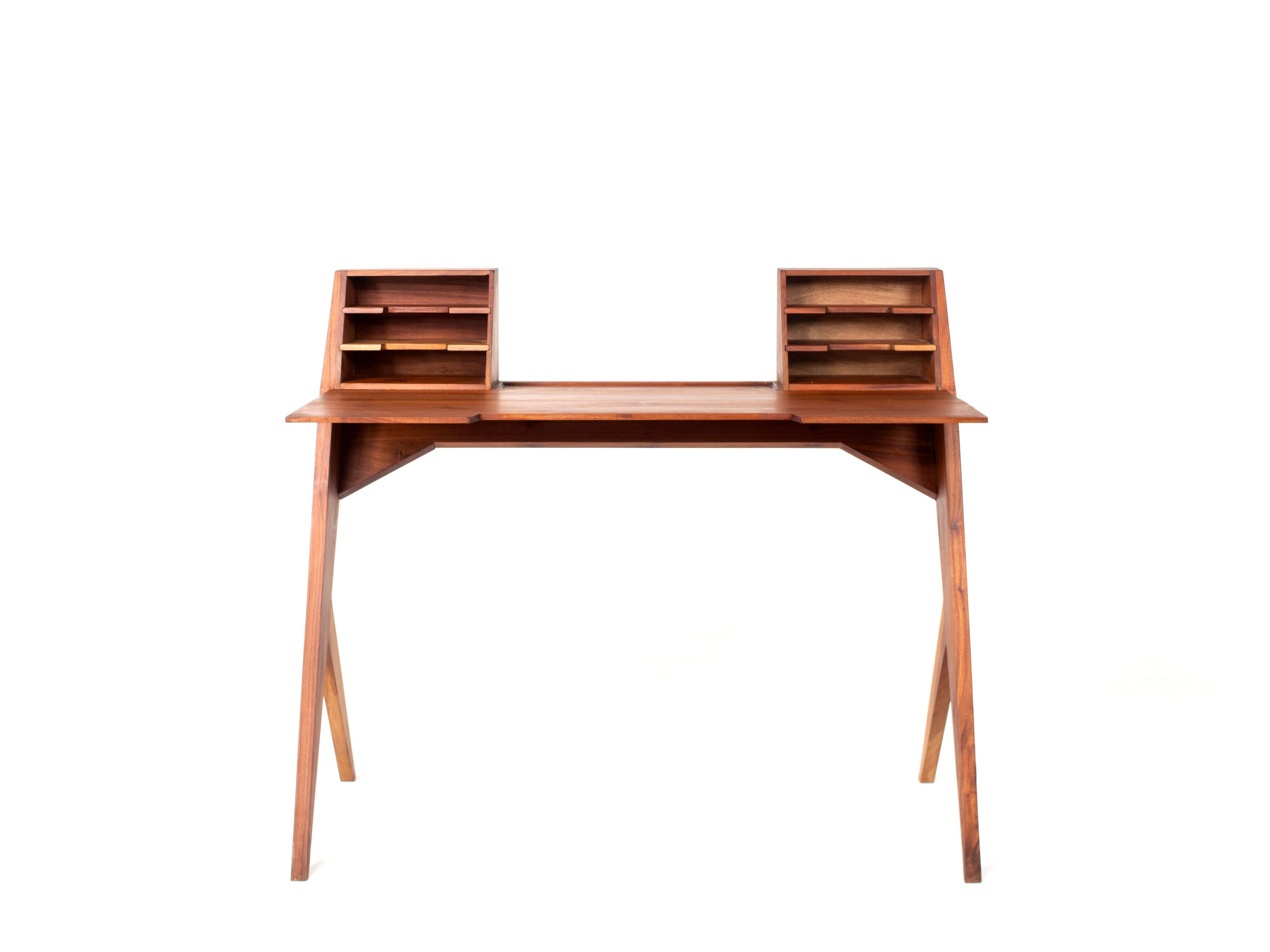 Handcrafted teak desk made in Italy with a stunning design. We were able to get this from an old factory in southern Italy. The design is timeless and the desk will quickly become a conversation piece. Especially the legs are elegant and