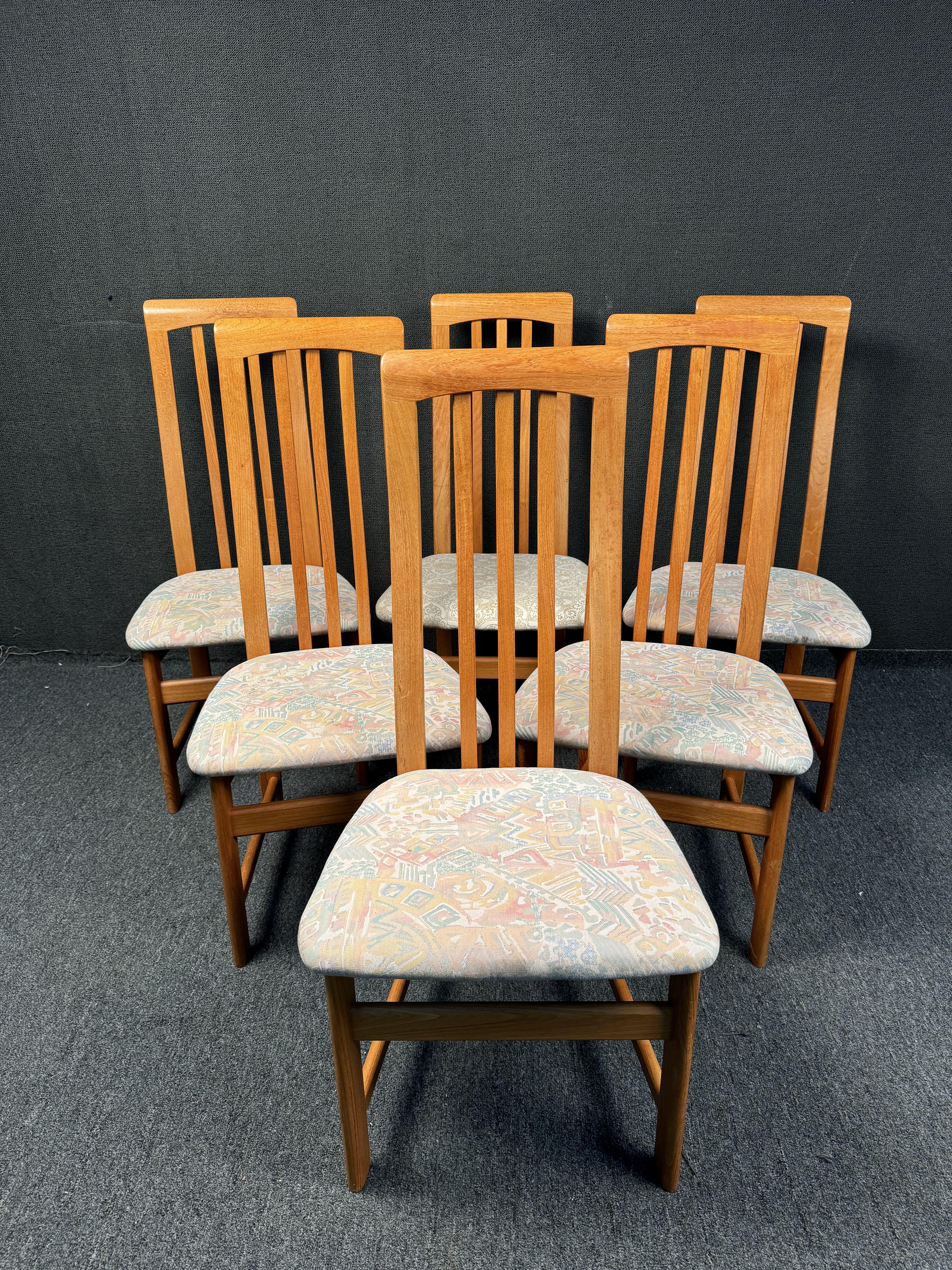 Beautiful Vintage Teak Dining Chairs by Nordic Furniture.  Featuring stunning teak wood, sculpted backs and MCM design. These chairs are a perfect addition to any dinning room table in need of chairs. Please confirm location with seller (NY or NJ)