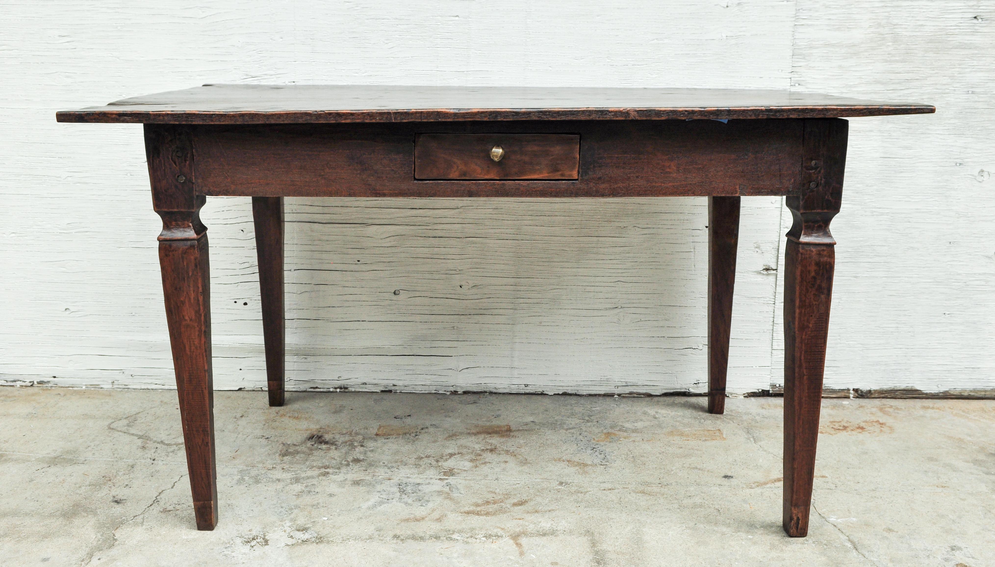 Vintage teak dining or kitchen table. Measure: 54
