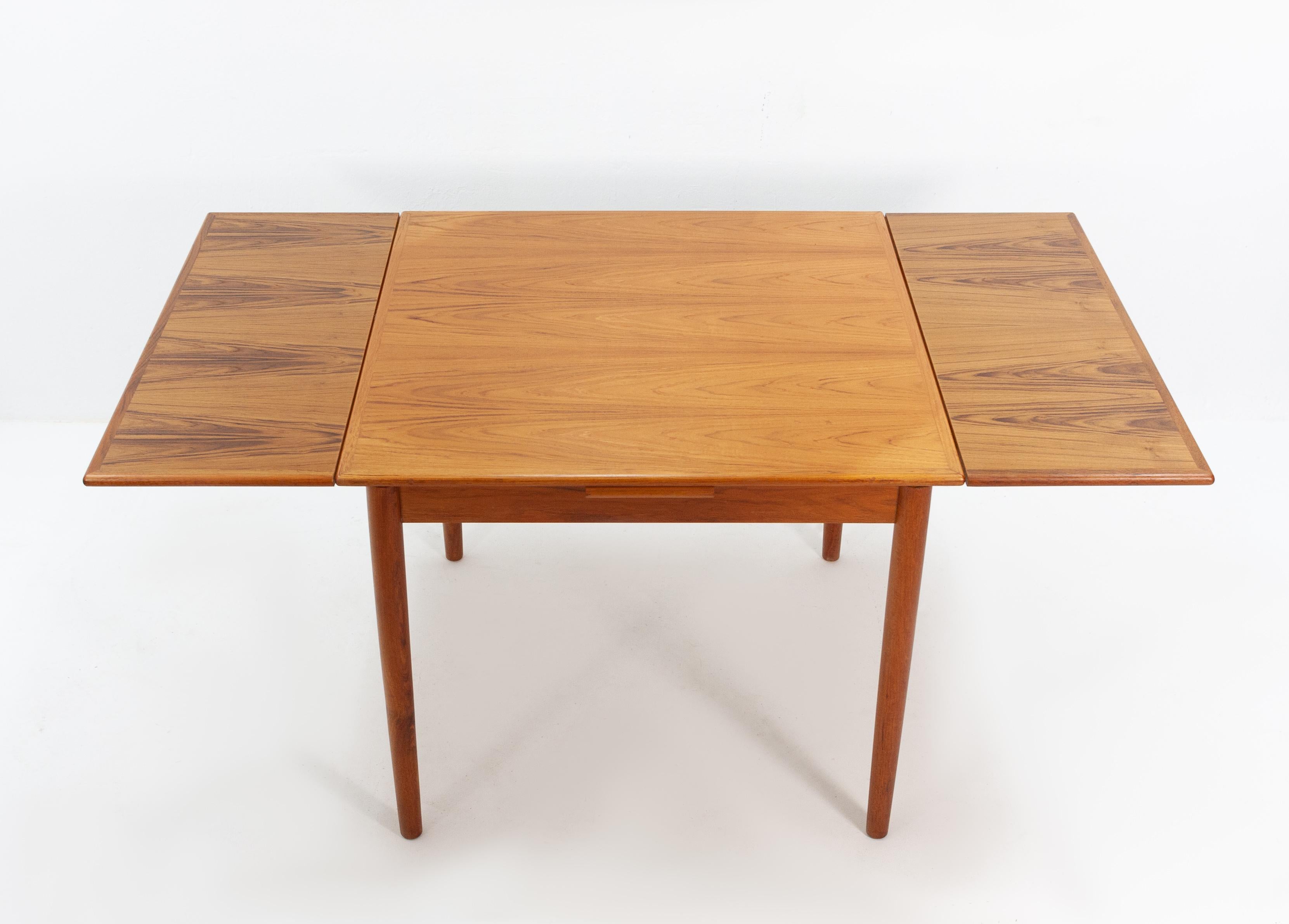 Teak extendable table. Made in Denmark by AR, 1960s. Beautiful small dining table. Good condition.
Extends via two extra leafs which can be stored inside the table when not in use. Legs are removable.
Extend from 87-157 cm.





     