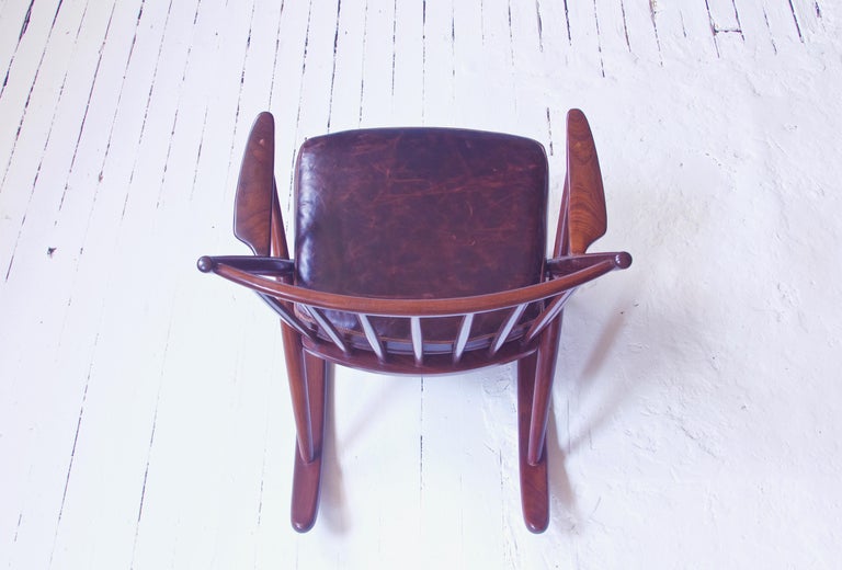 Scandinavian Modern Vintage Teak Frank Reenskaug Spindle Back Rocking Chair Model 182. Denmark, 1958 For Sale