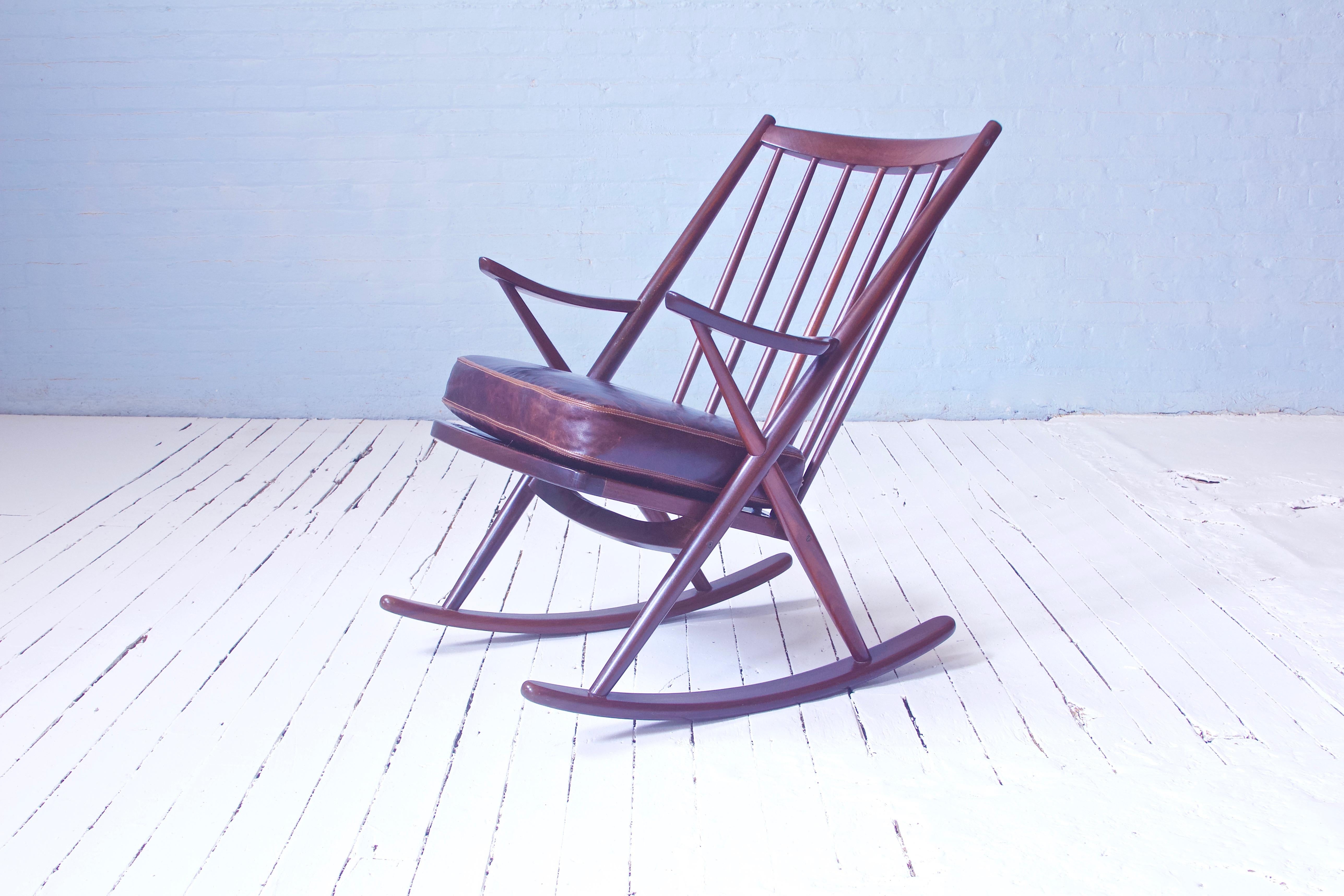 Scandinavian Modern Vintage Teak Frank Reenskaug Spindle Back Rocking Chair Model 182. Denmark, 1958 For Sale