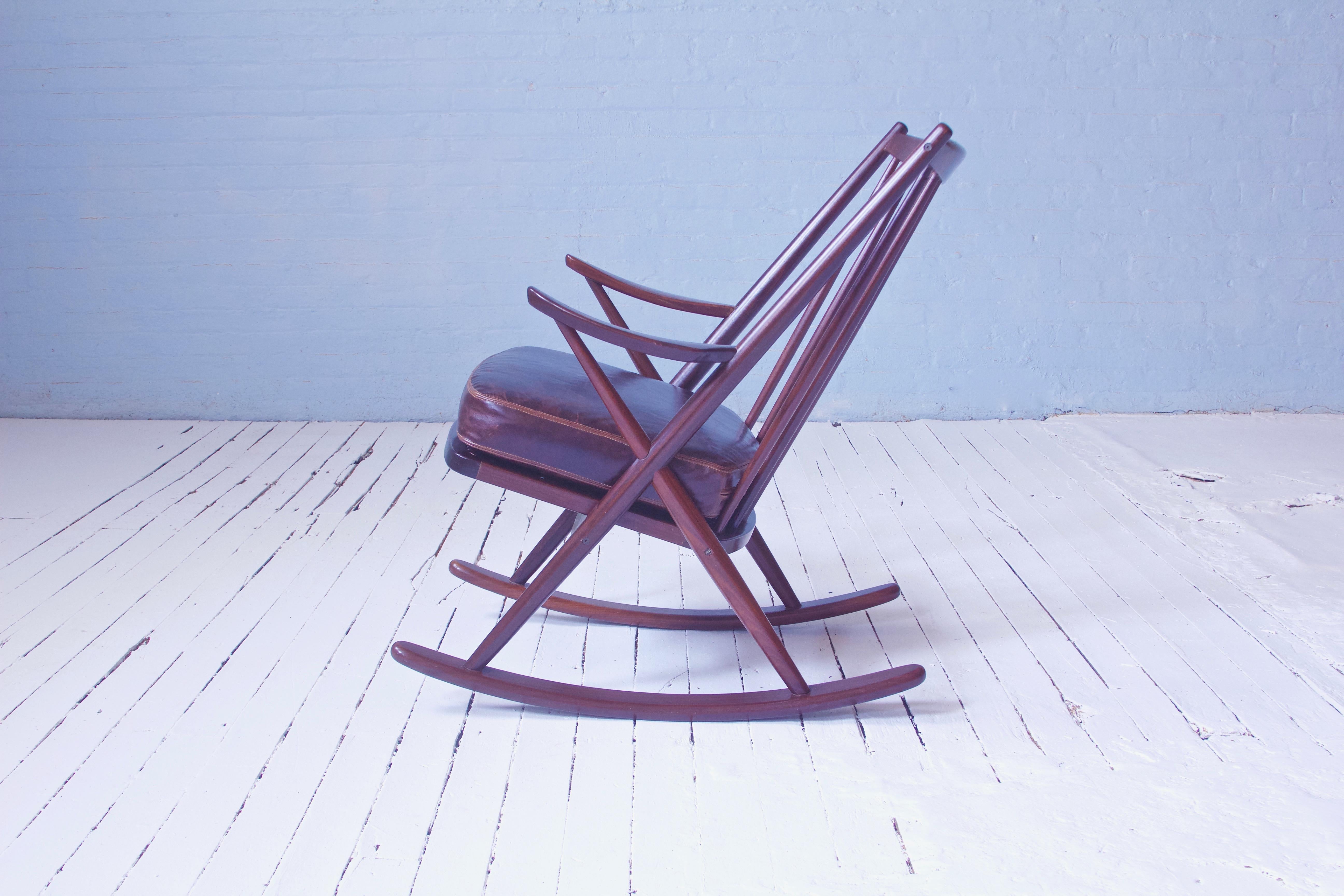 Danish Vintage Teak Frank Reenskaug Spindle Back Rocking Chair Model 182. Denmark, 1958 For Sale