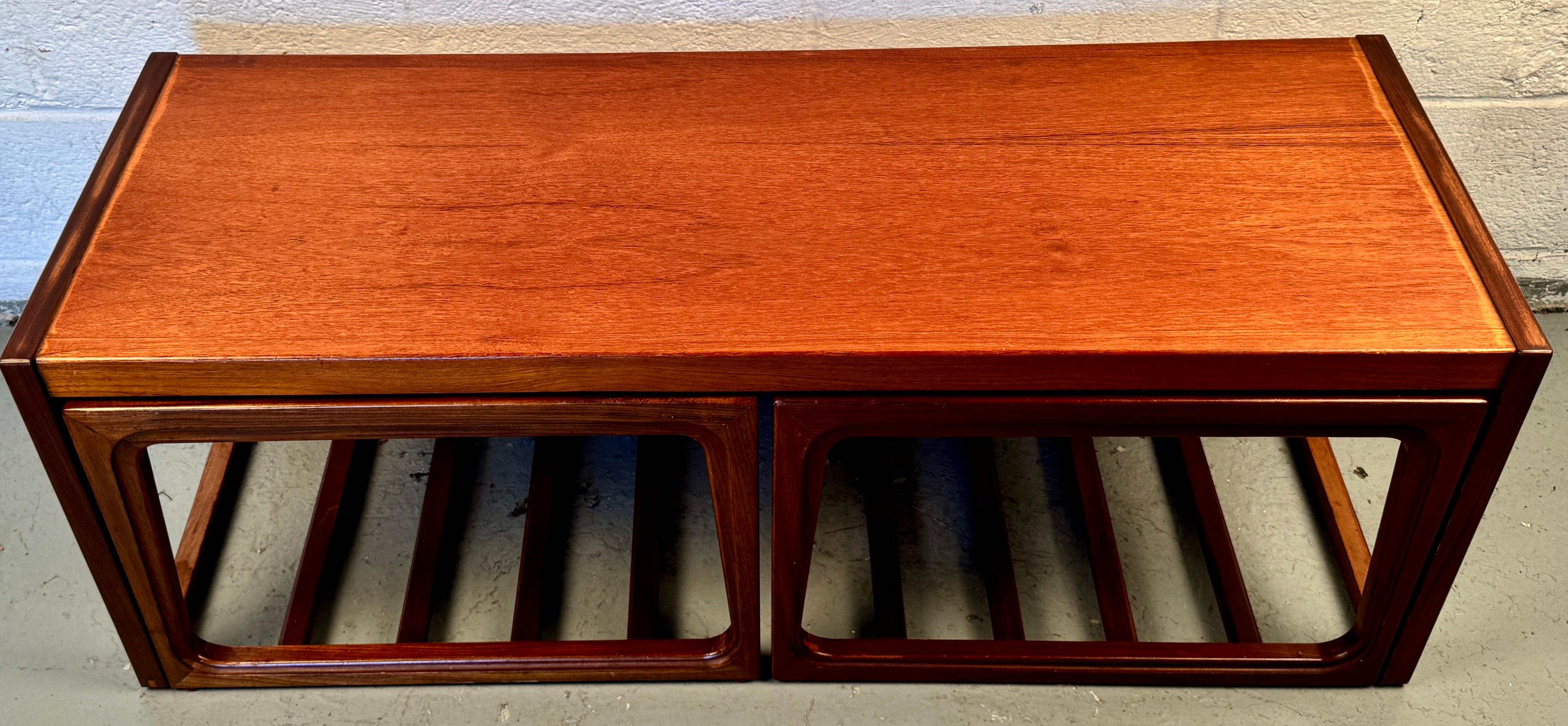 Bring flexible, sculptural style into your space with this gorgeous set of retro teak nesting tables, crafted in the spirit of 1960s Scandinavian design. Perfectly versatile and effortlessly stylish, they’re an ideal addition to your living room,