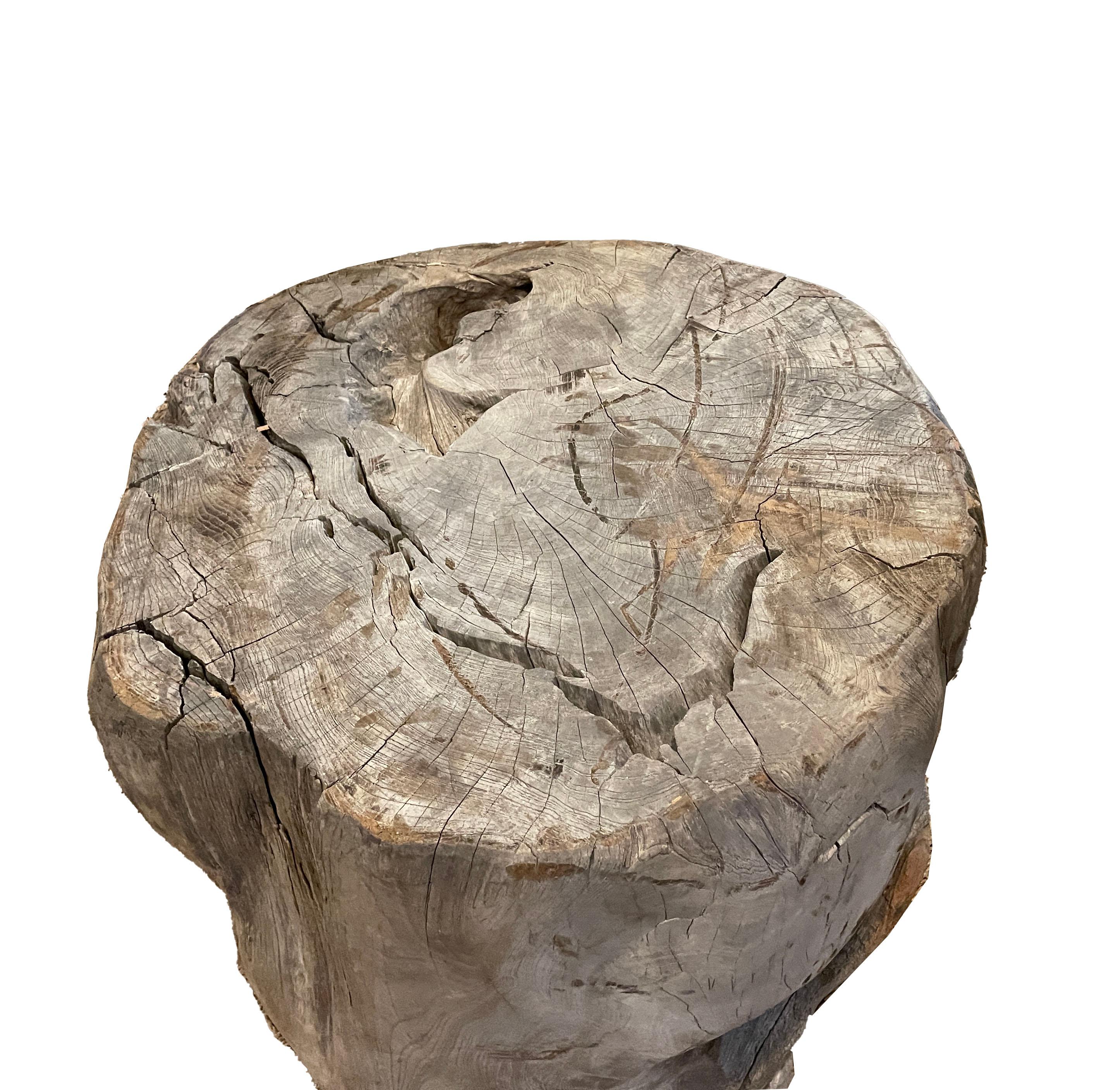 Lovely vintage grey weathered teak root table. This table is a good size for a side table or small cocktail table.