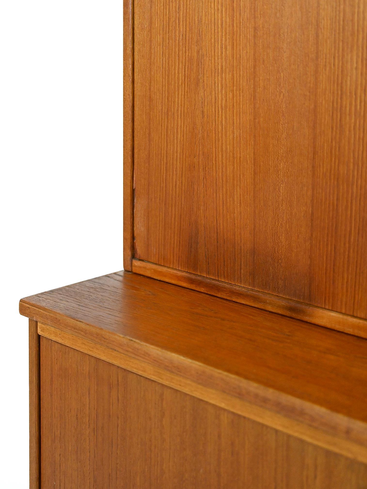 Vintage teak sideboard with hinged doors For Sale 3