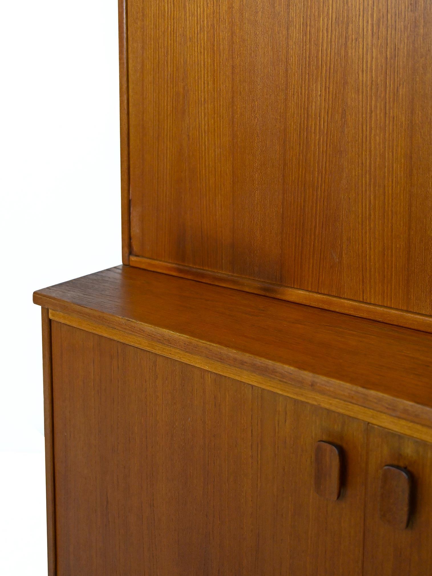 Vintage teak sideboard with hinged doors For Sale 2