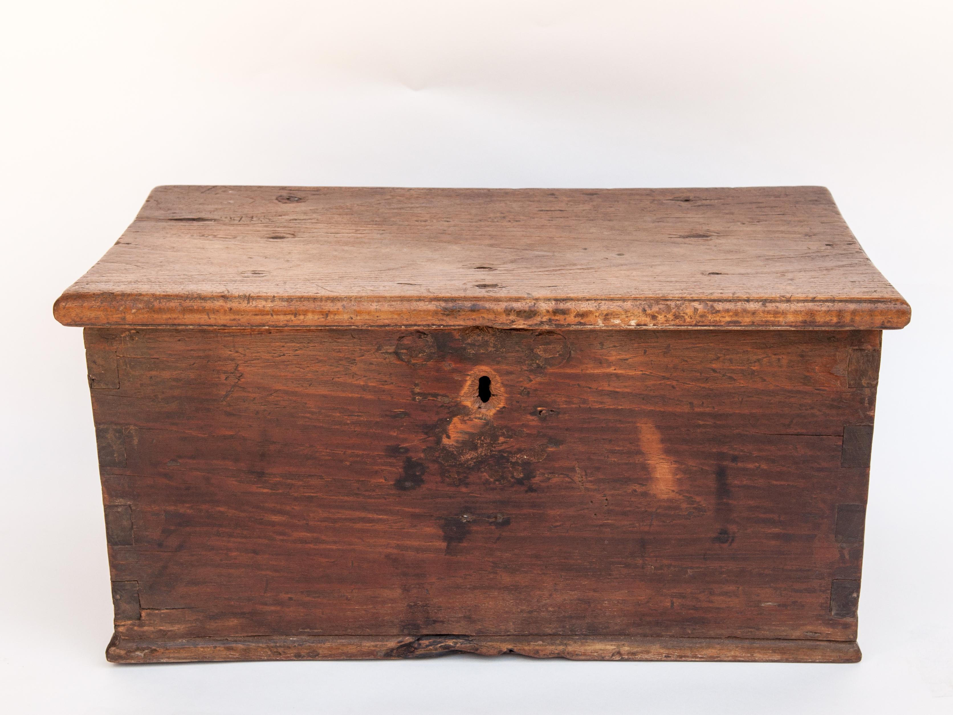 Vintage teak storage chest from Java, mid-20th century.
This beautifully patinated old teak wood chest would have been used to store textiles and other valuables in a rural Javanese home. It comprises high quality old growth teak planks, solid and