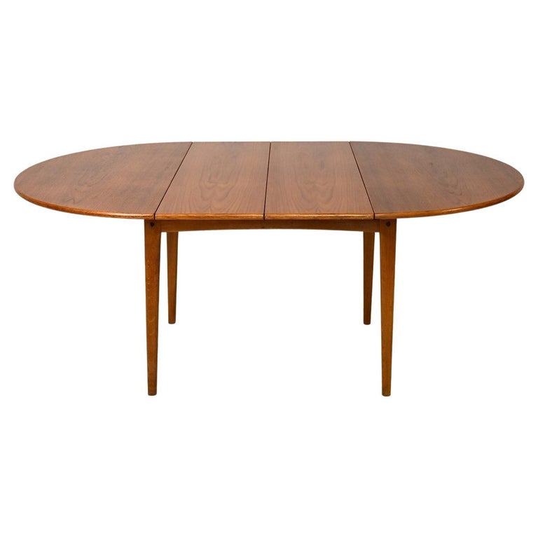 Vintage teak table with two extensions For Sale at 1stDibs