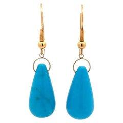 Boucles d'oreilles pendantes en fil d'or et turquoise