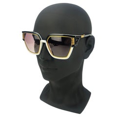 Lunettes de soleil vintage Ted Lapidus noir, blanc et or c1970s