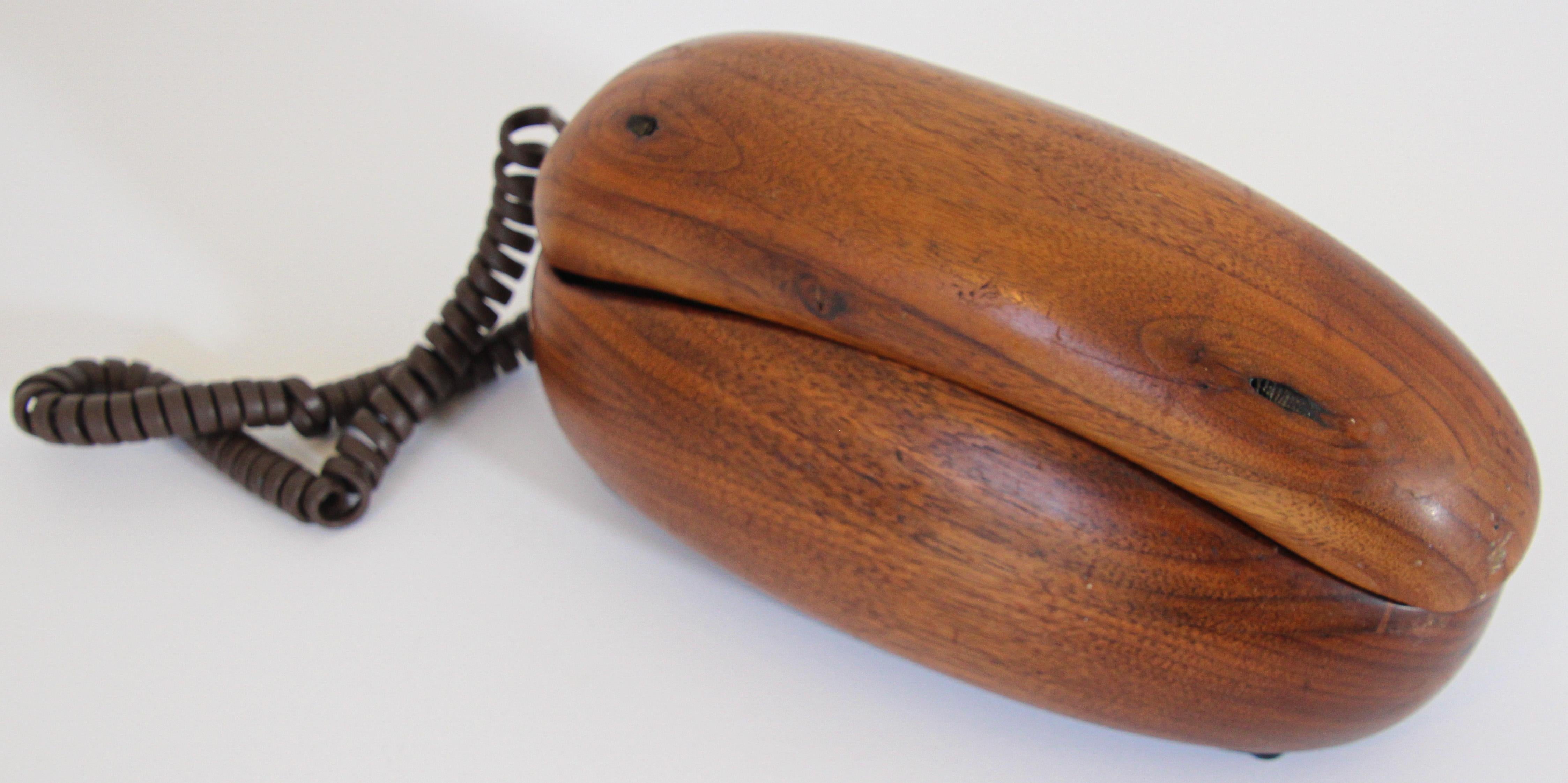 Vintage telephone covered in wood made in Asia, Singapore for 