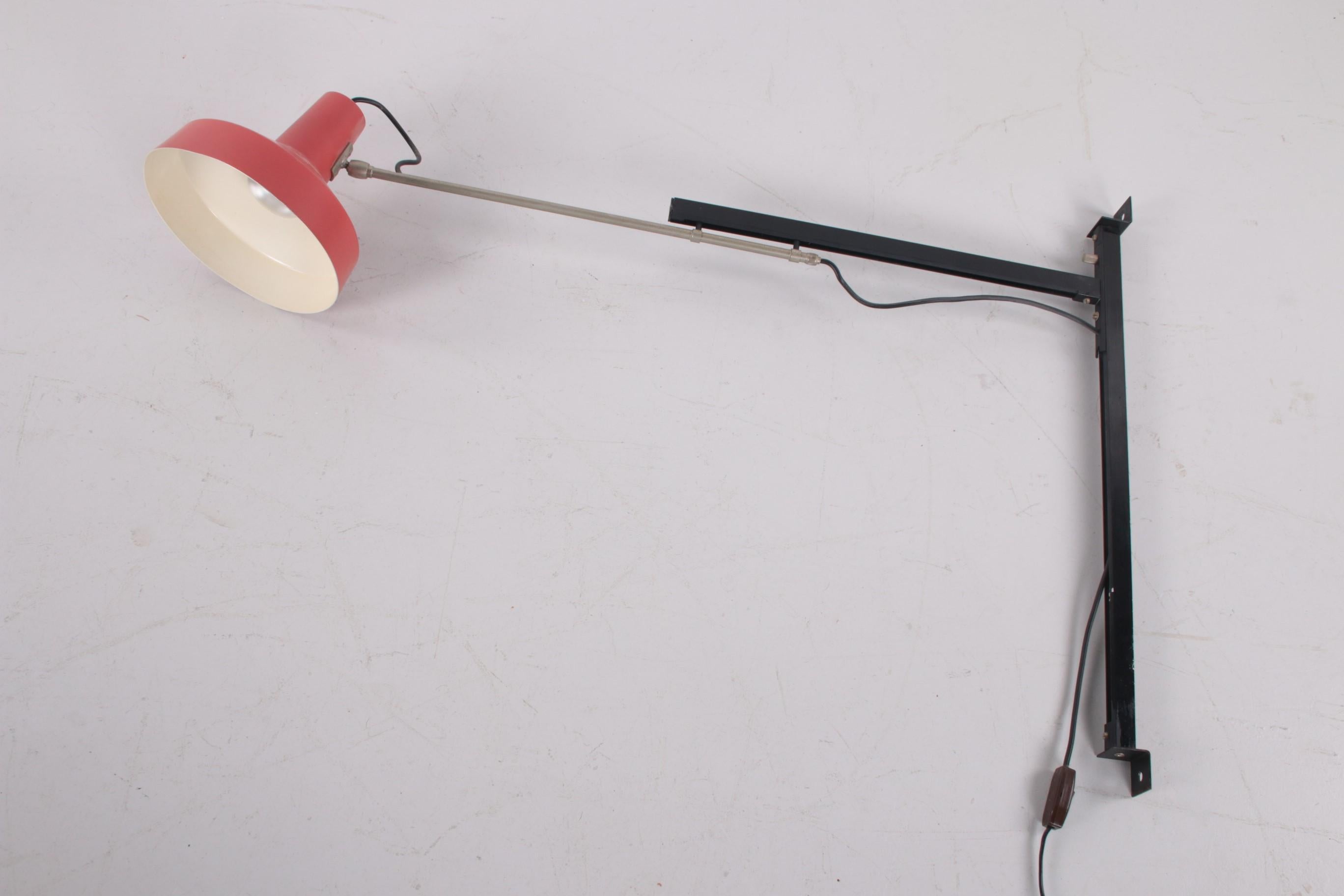 Rare and special item, this extendable Industrial wall lamp from Hiemstra Evolux. Also called telescope lamp. 
You don't often come across this model. Period:1960s. 
For that time a very progressive design by Hiemstra Evolux. 
The company was