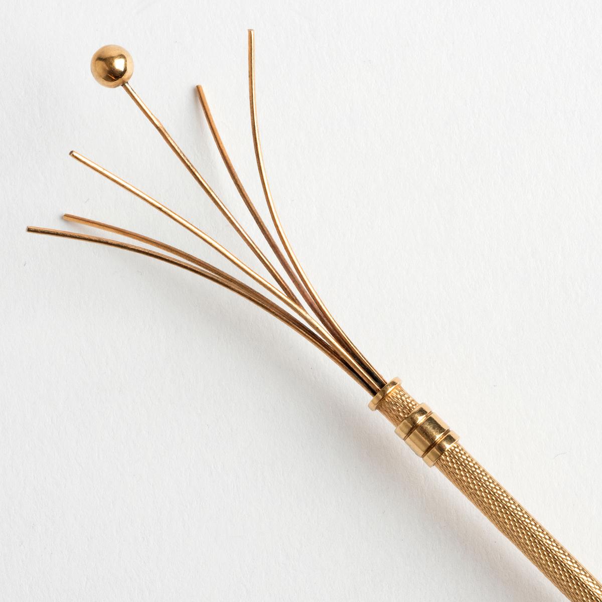 A unique piece within our carefully curated Vintage & Prestige fine jewellery collection, we are delighted to present the following:

Popular in the roaring '20s and 1930s, a champagne swizzle stick was used to remove and reduce bubbles in a glass