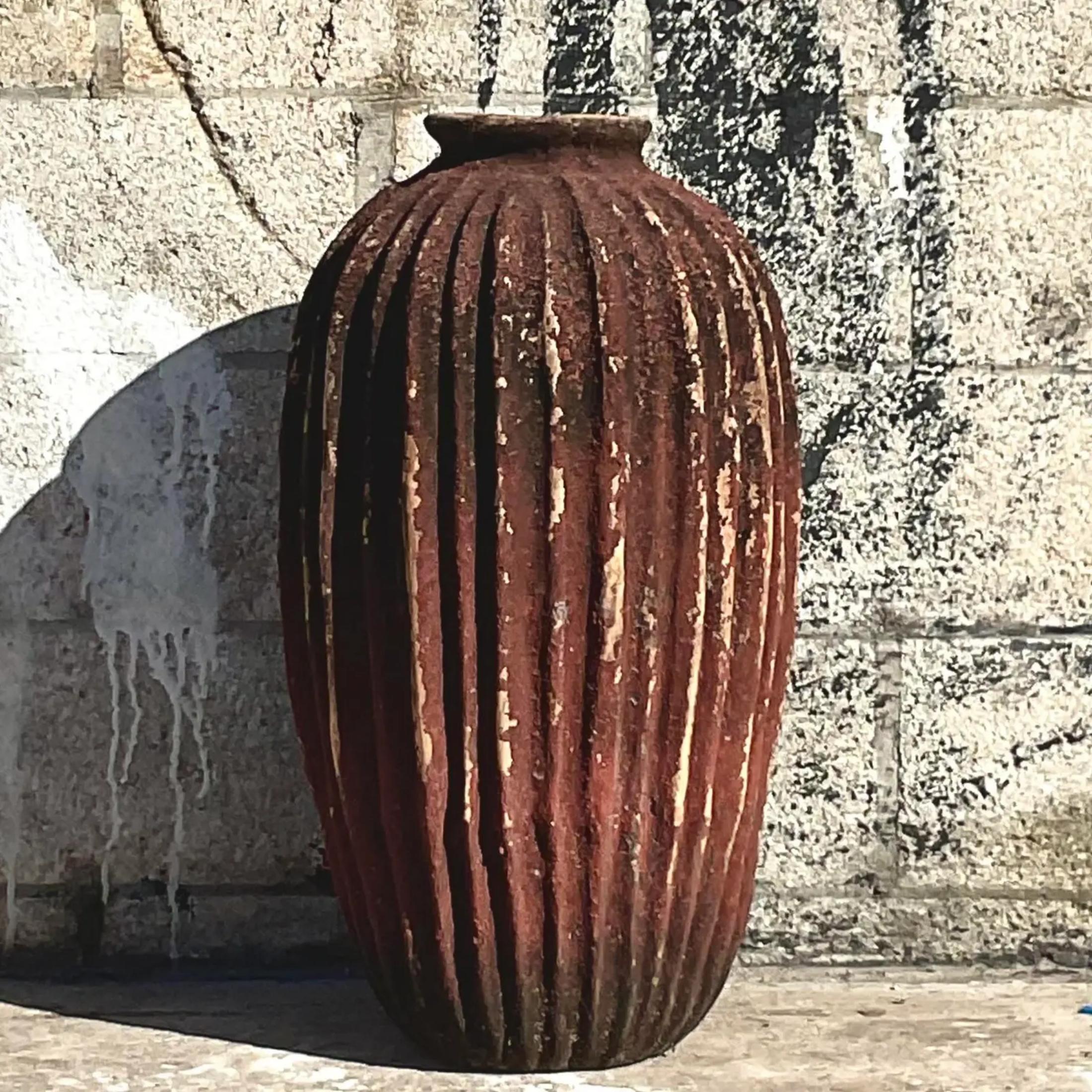 A fabulous vintage terracotta planter with ridges all over its surface. It’s unique in size and a great addition to your garden alone or in a set. Acquired at a Palm Beach estate