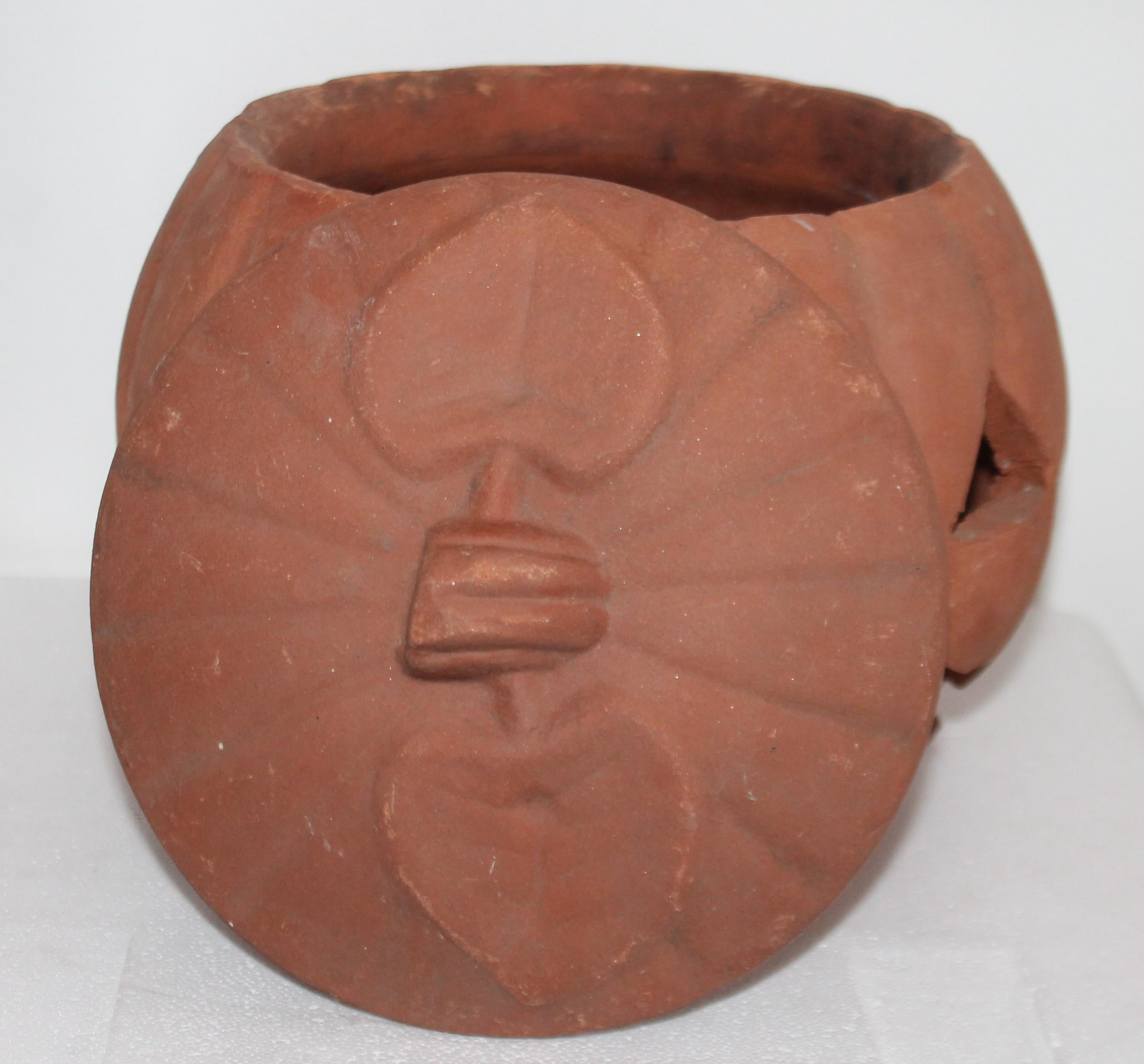 terra cotta jack-o-lantern outdoor