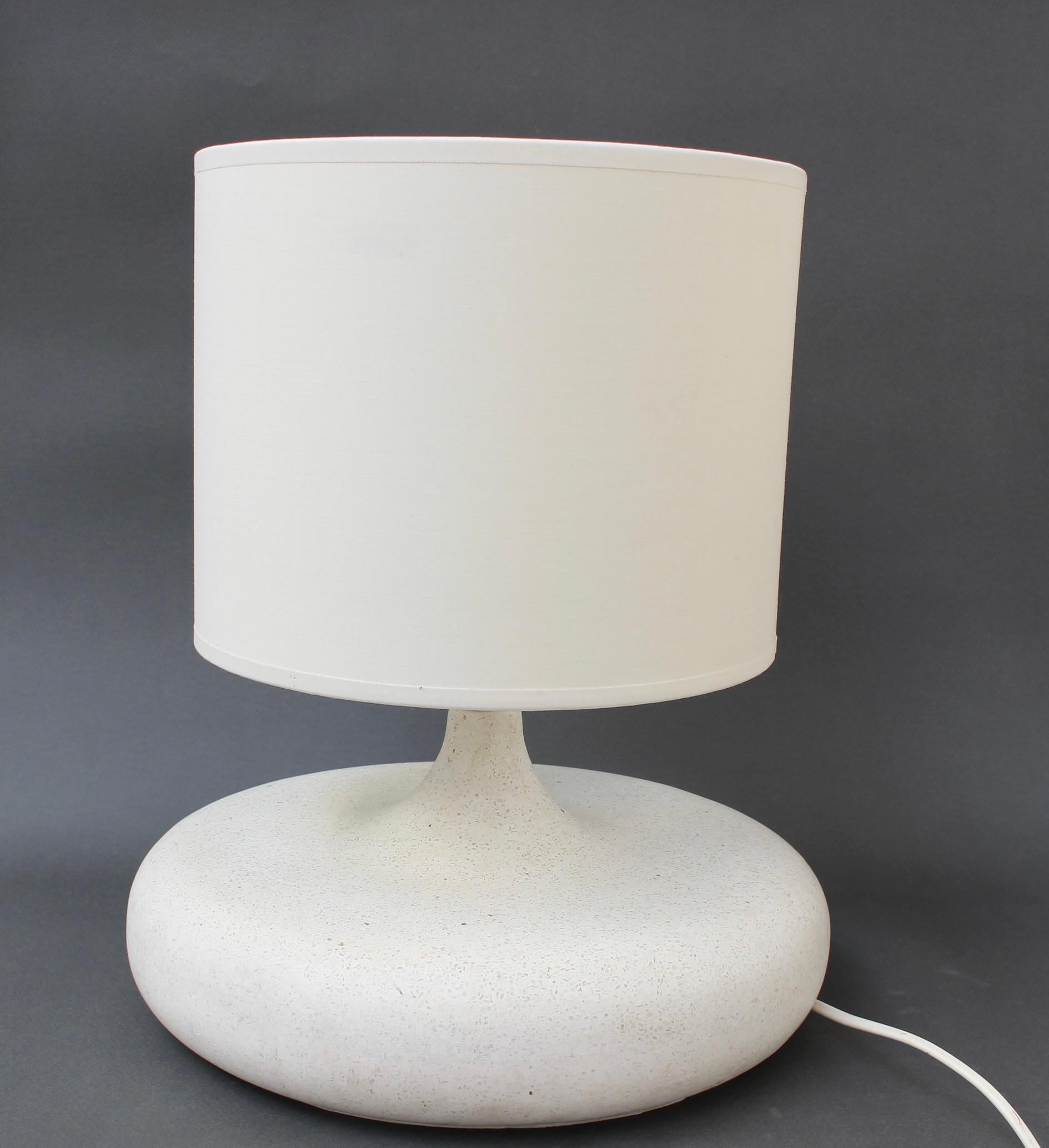 Vintage terrazzo flat stone table lamp by Habitat (circa 1990s). Very weighty, visually alluring and tactile all at once, this vintage Habitat lamp made for the French market brings a smile to your face (Habitat opened in France in 1973). Currently