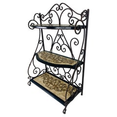 Vintage tessellated marble Bakers rack in the manner of Maitland Smith