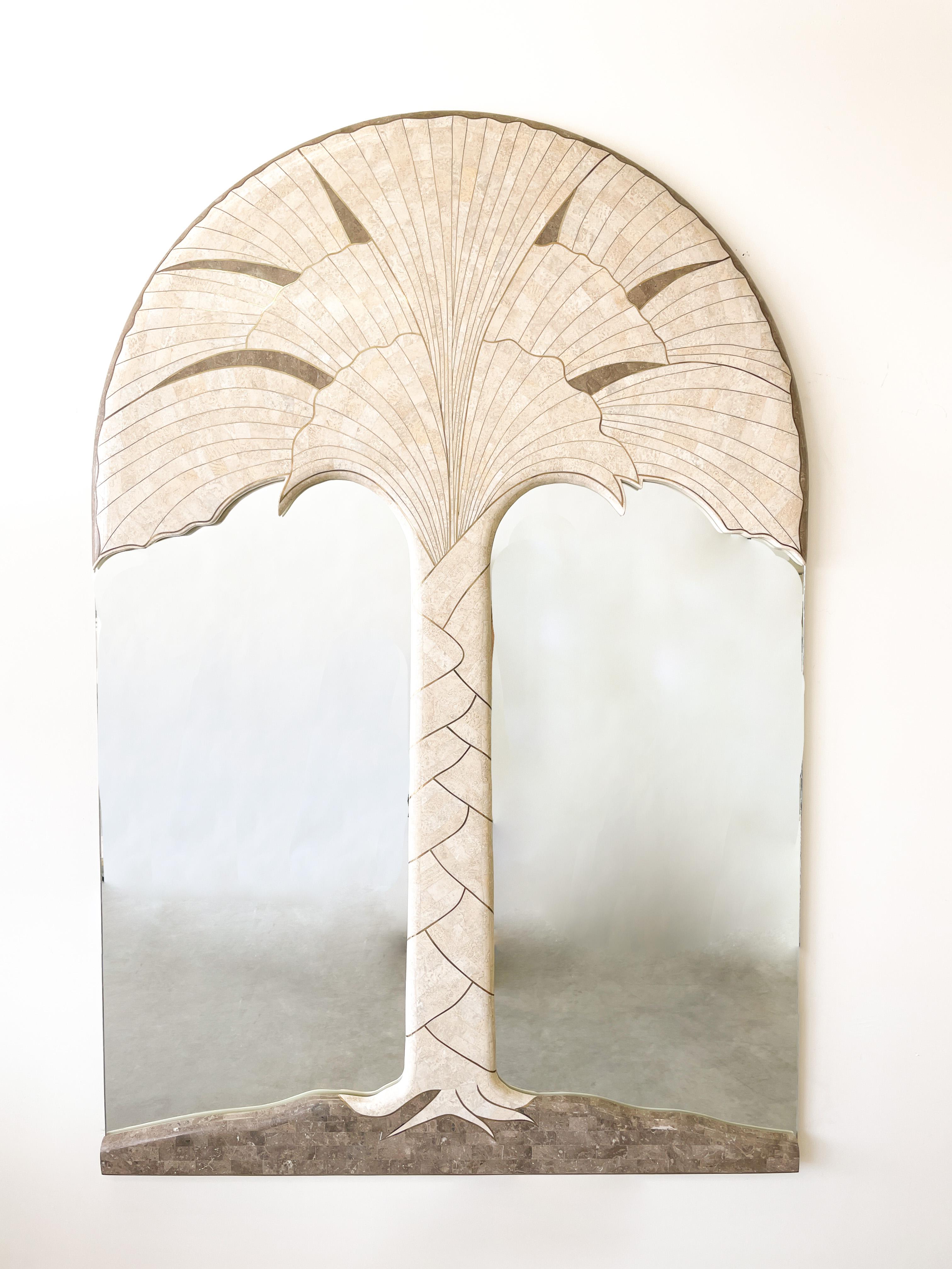 Vintage 80s, Tessellated Marble Stone Palm Tree With Brass Inlay Mirror.

The mirror is tessellated marble with brass inlay.
Very heavy and made very well.

Frame Color: Natural light cream & brass

Measurements:
Width: 48 1/4