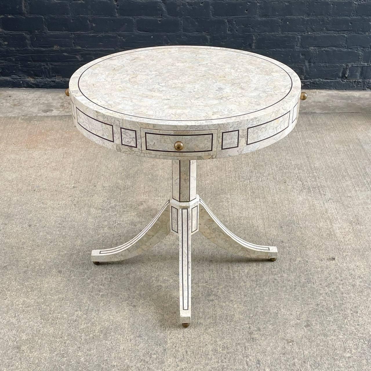 Vintage Tessellated Pedestal Drum Table by Maitland Smith

Country: United States
Materials: Wood, Brass, Stone
Condition: Original Vintage Condition
Style: French Neoclassical
Year: 1950s

$2,500

Dimensions:
29.25”H x 28.25”W x 28.25”D