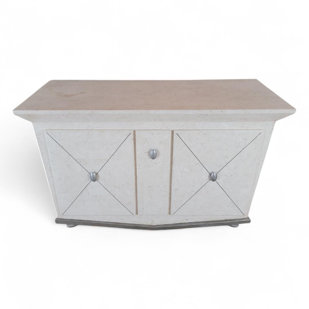 Vintage Contemporary Tessellated Stone Wrapped 2 Door w/ Pull Out Shelf Drawer Credenza/Hall Chest

Great for storage, this vintage contemporary Credenza Sideboard is detailed with two doors in tessellated stone and a pull out shelf drawer.

