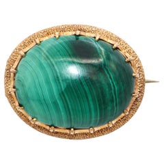 Spilla in malachite d'epoca in oro giallo 14 ct.