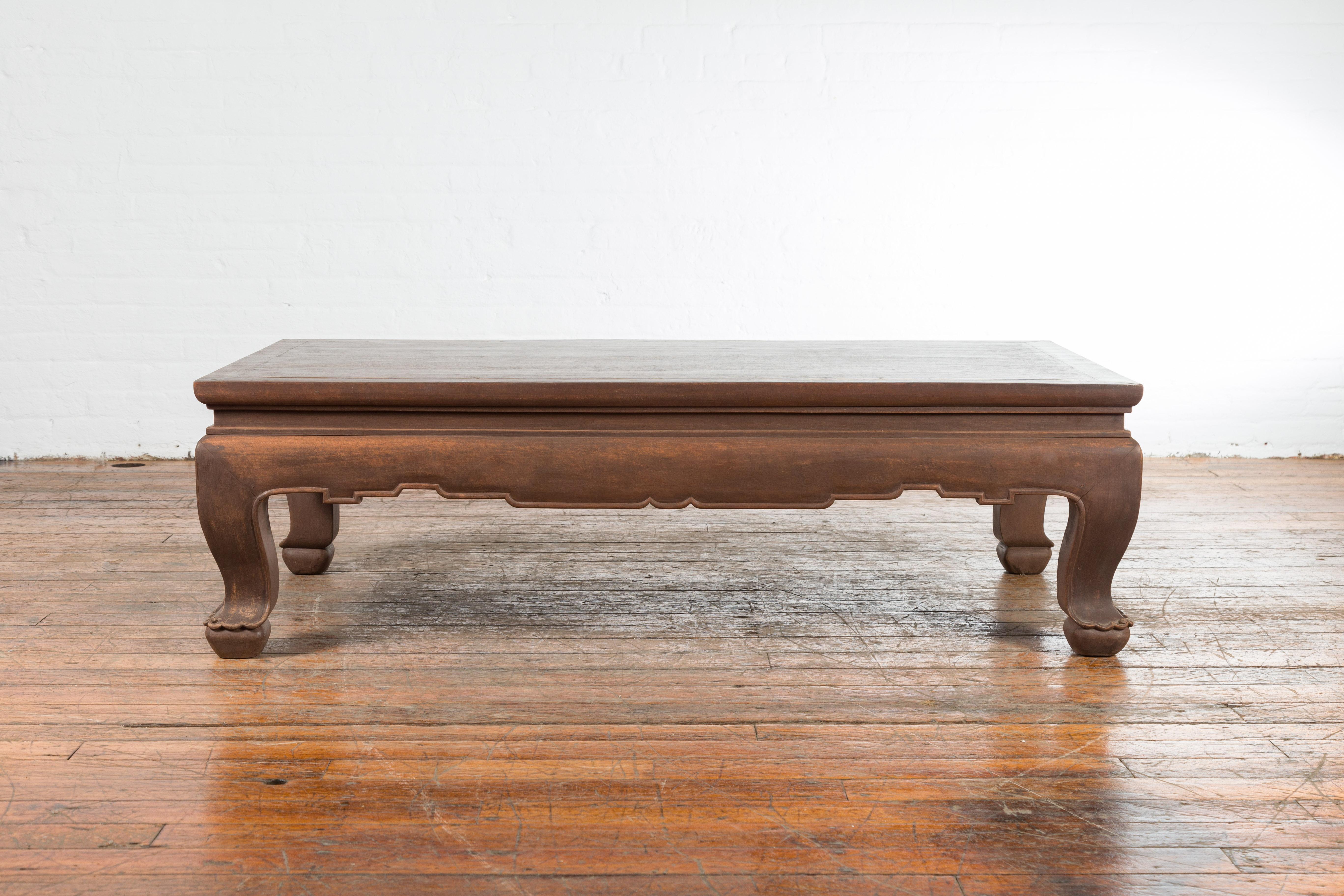 Vintage Thai Brown Wooden Coffee Table with Waisted Carved Apron and Chow Legs For Sale 2