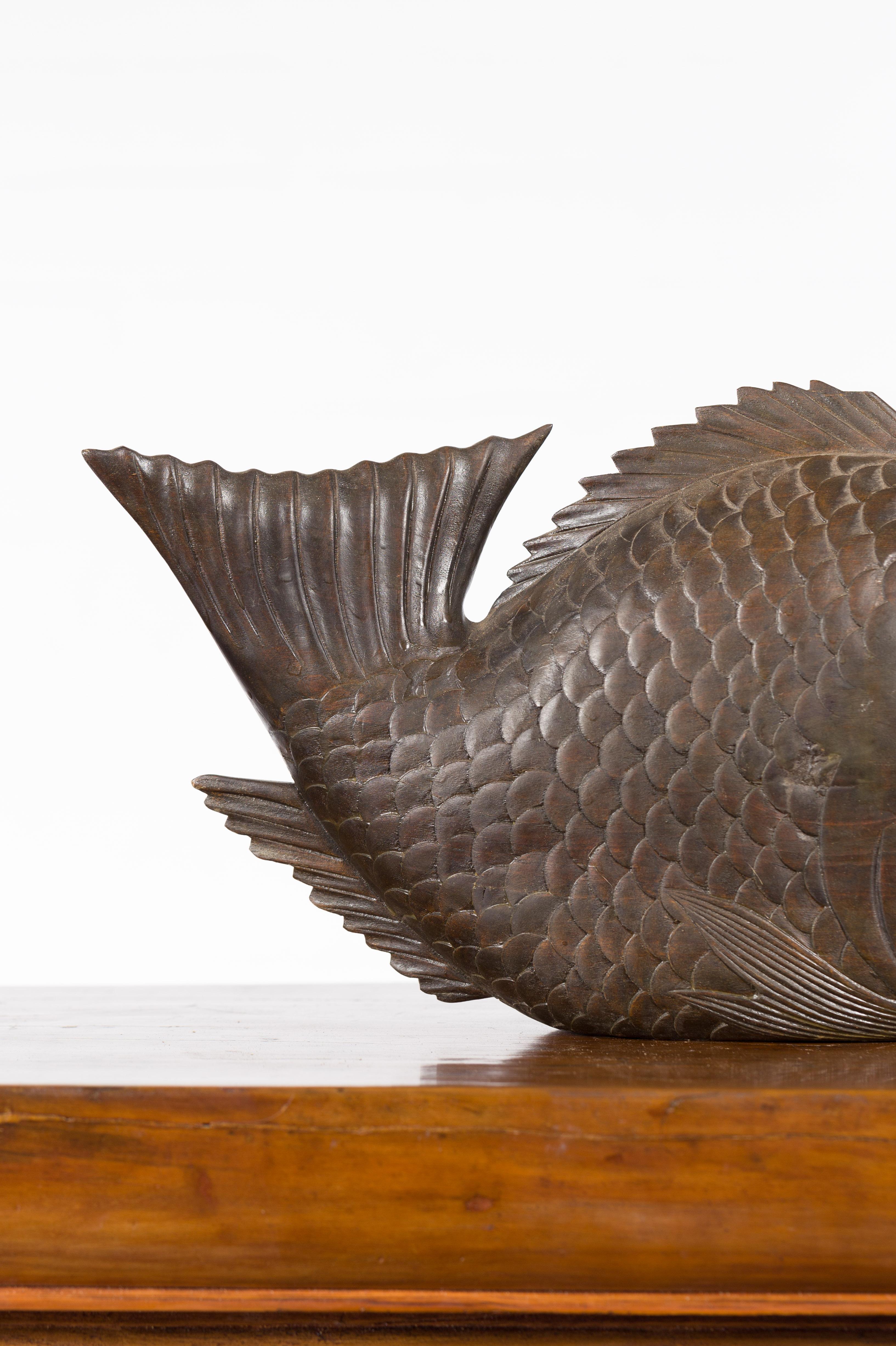 Vintage Thai Carved Wooden Carp Sculpture with Detailed Scales and Dark Patina 1
