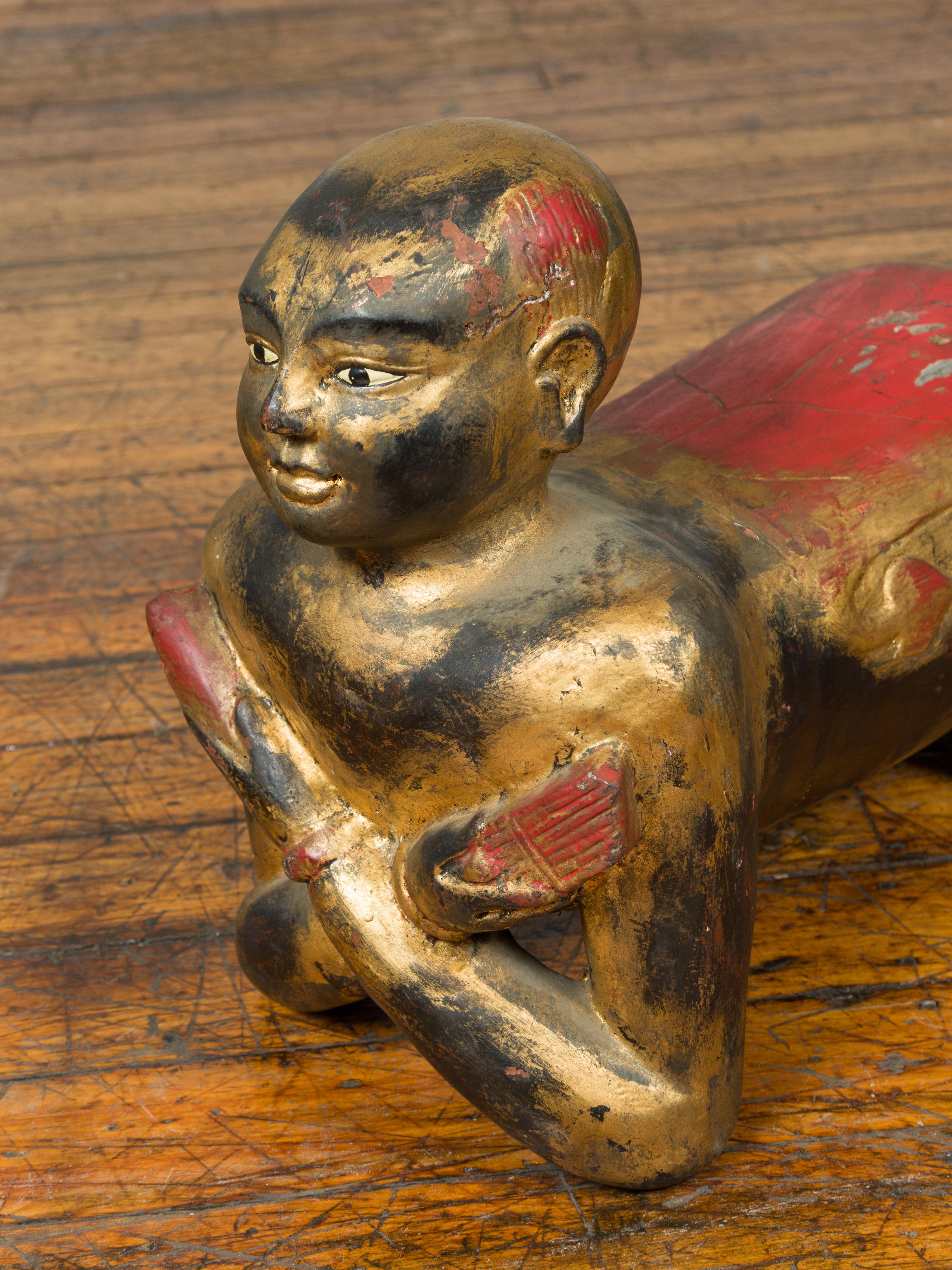 Vintage Thai Ceremonial Gilt Carved Temple Guardian with Black and Red Patina In Good Condition For Sale In Yonkers, NY