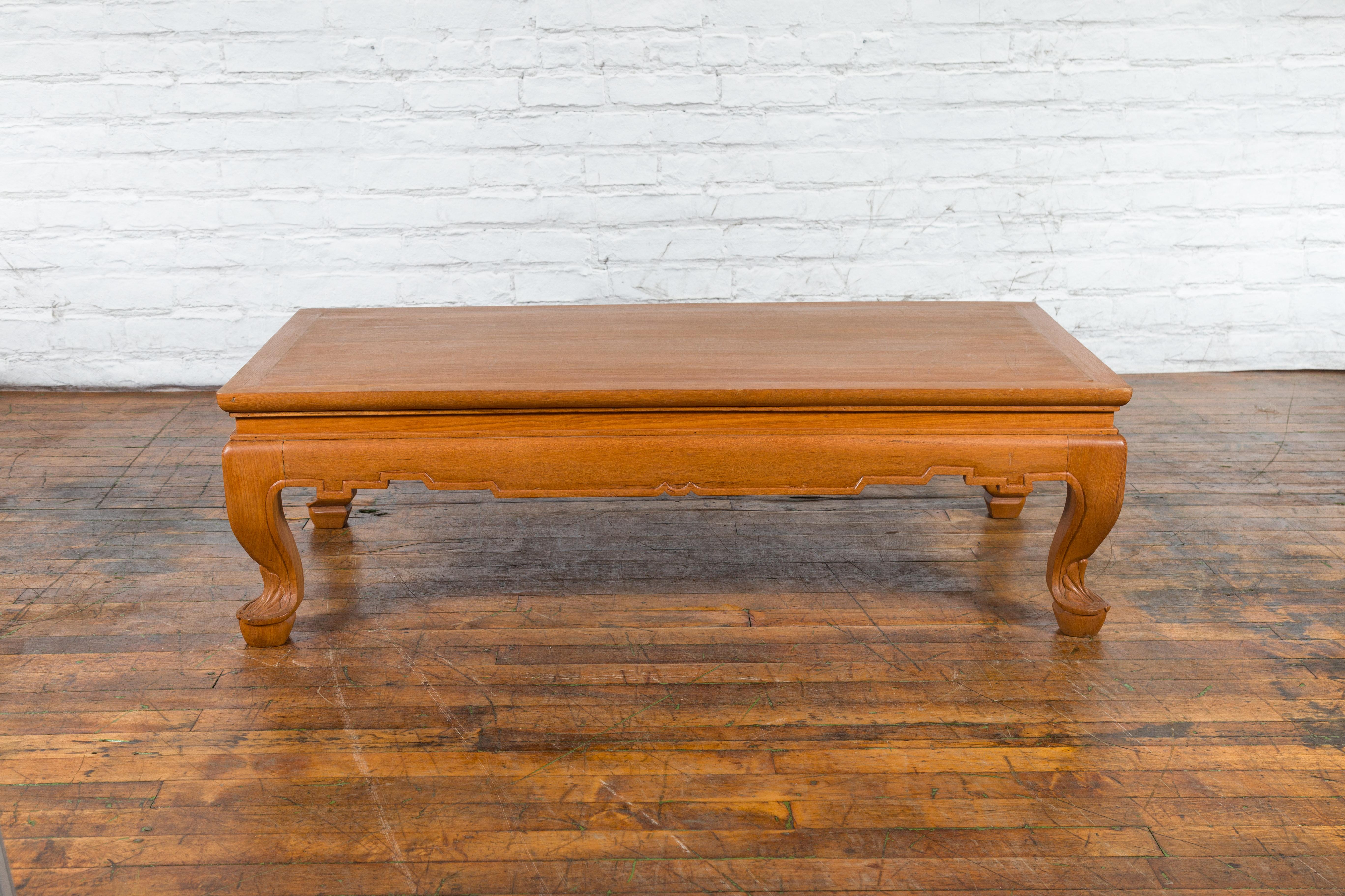 20th Century Vintage Thai Coffee Table with Waisted Top, Carved Apron and Cabriole Legs For Sale