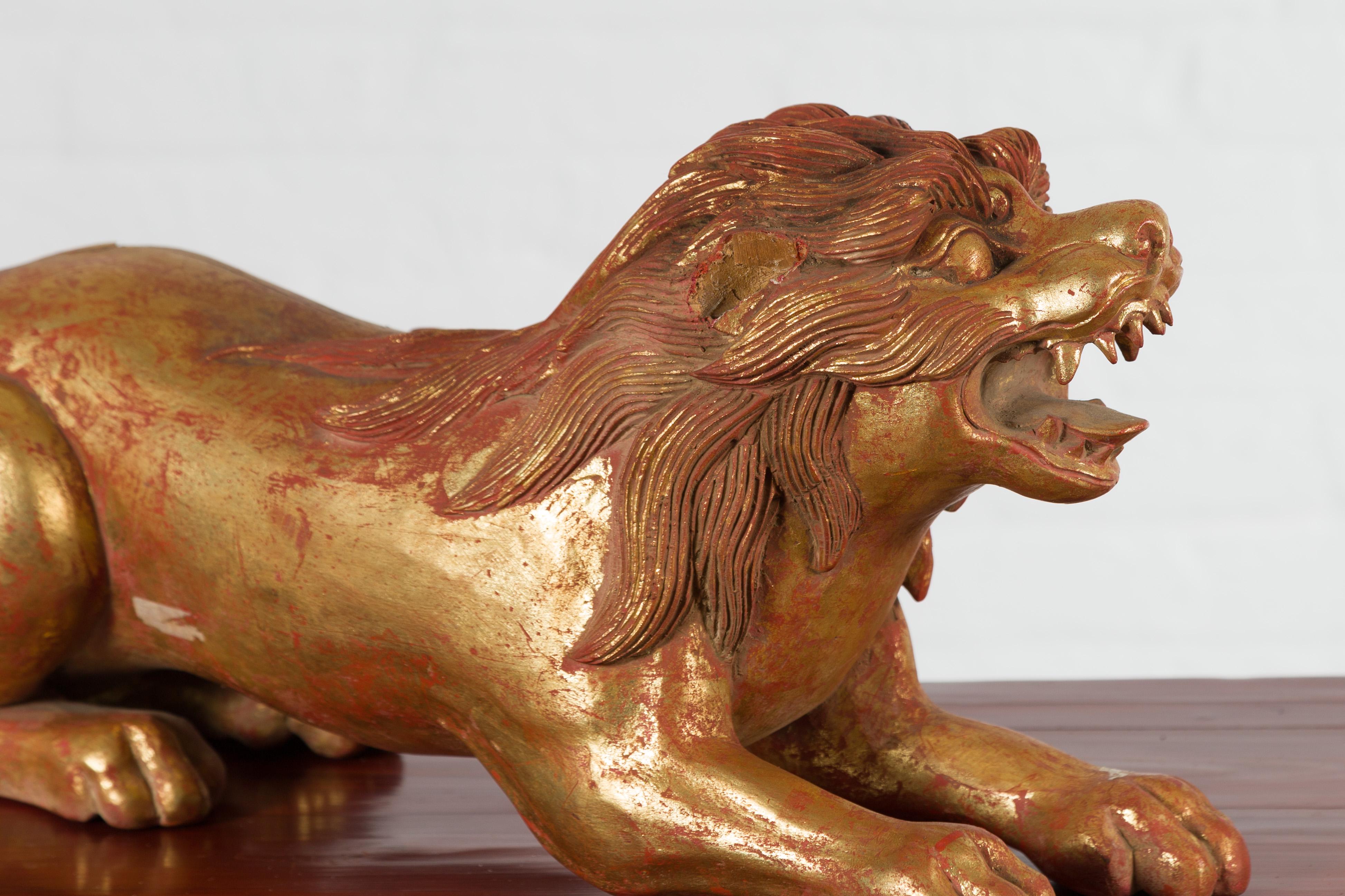 Vintage Thai Gilded and Carved Wooden Mythical Creature with Red Undertone In Good Condition For Sale In Yonkers, NY