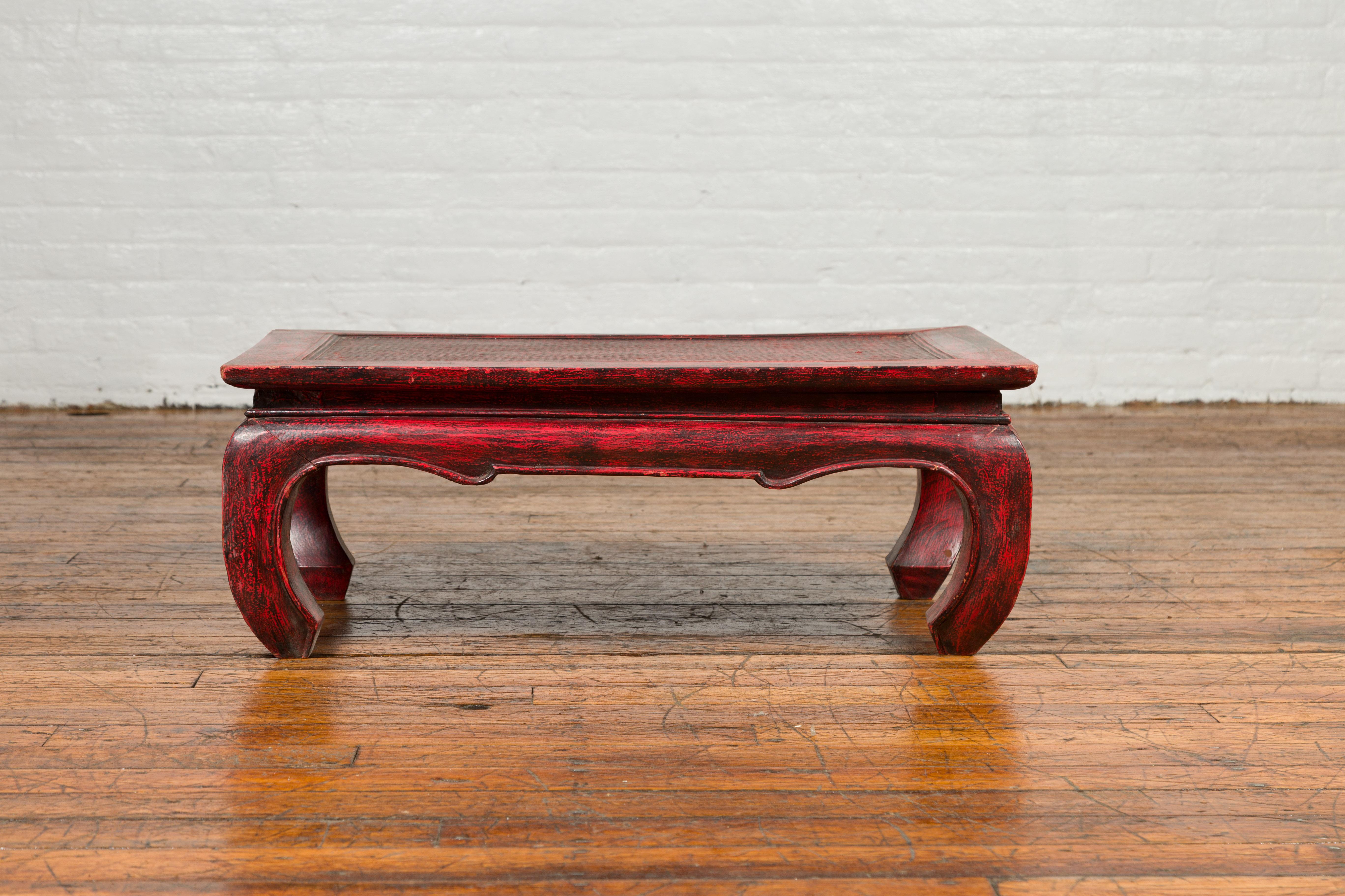 Wood Vintage Thai Red Lacquer Waisted Coffee Table with Rattan Inset and Chow Legs For Sale