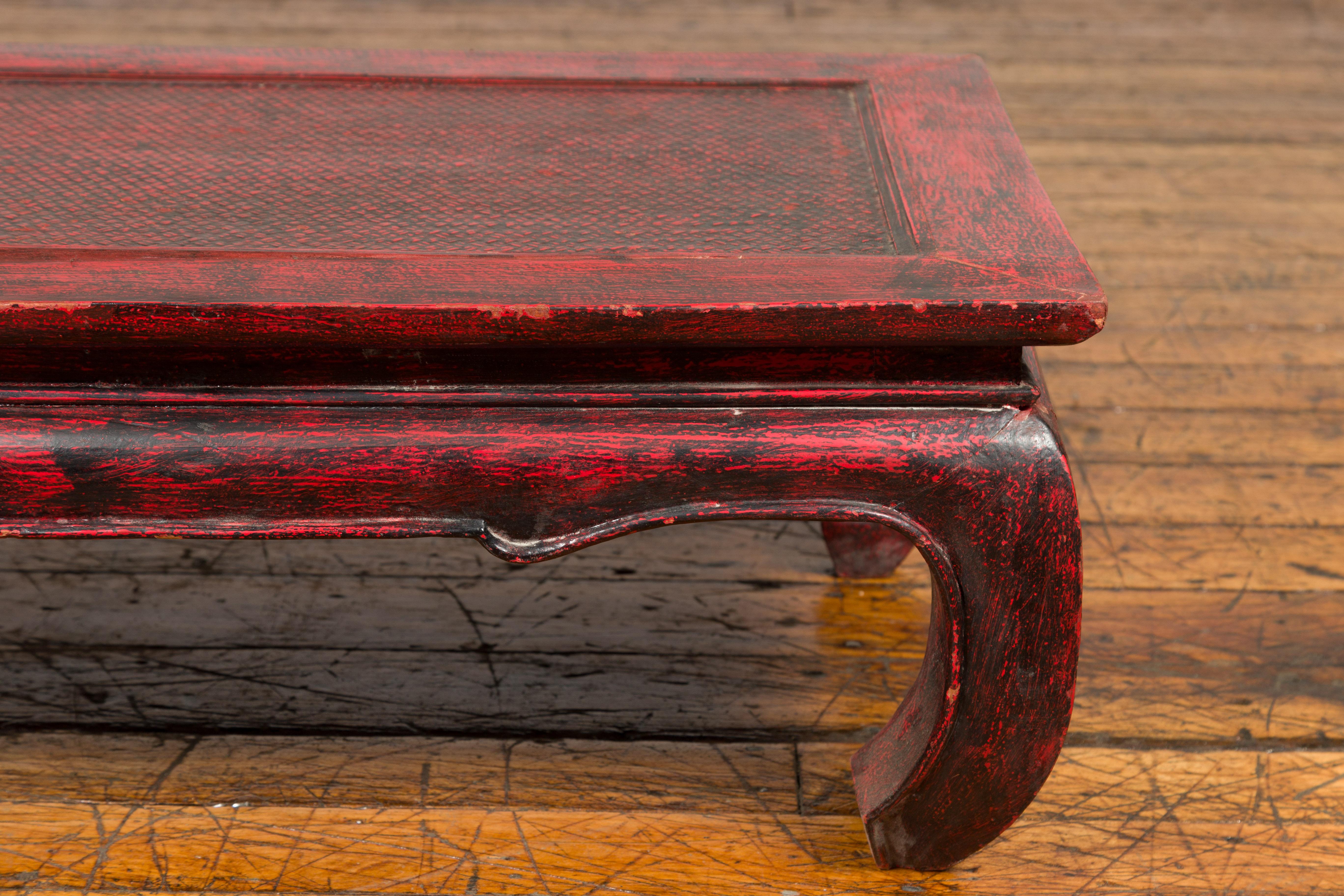 Ming Vintage Thai Red Lacquer Waisted Coffee Table with Rattan Inset and Chow Legs For Sale