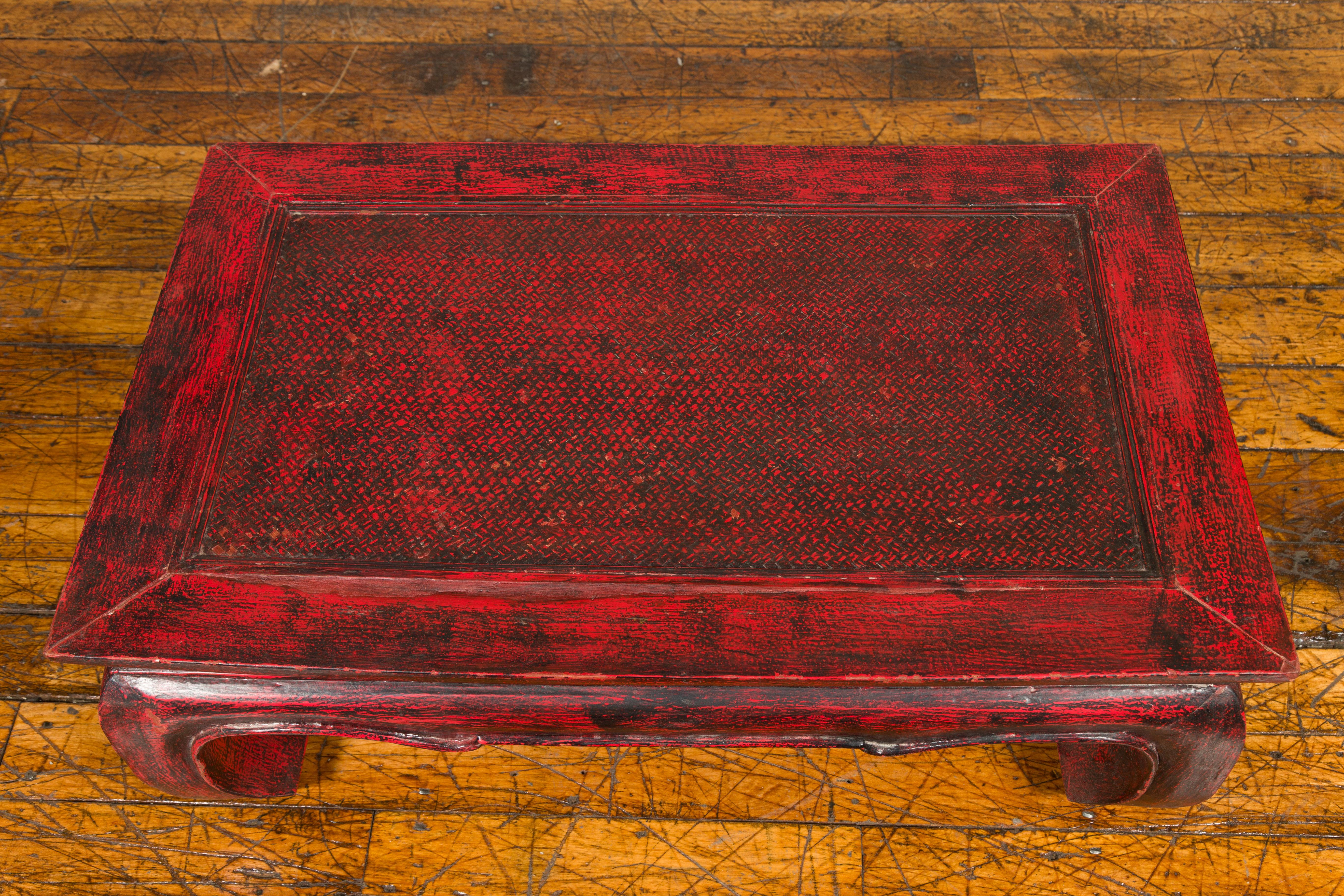 Vintage Thai Red Lacquer Waisted Coffee Table with Rattan Inset and Chow Legs In Good Condition For Sale In Yonkers, NY