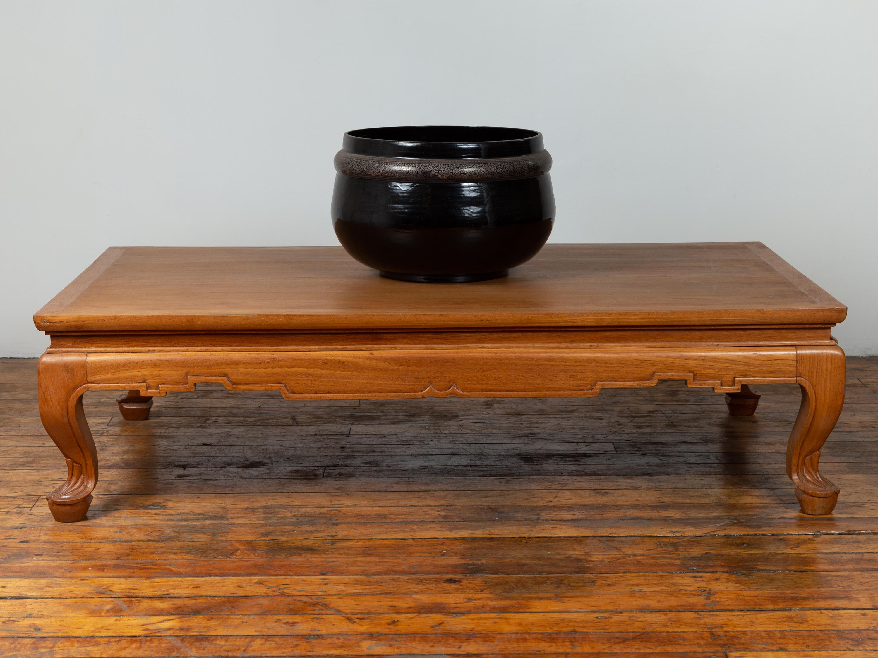 carved teak coffee table