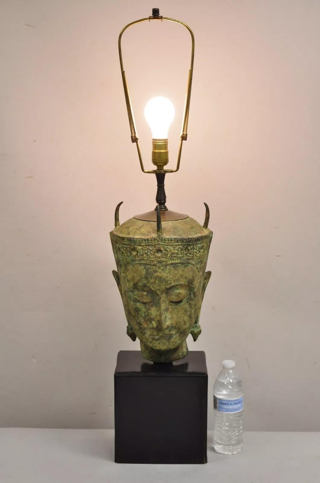 Vintage Green Verdigris Bronze Siamese Buddha Bust Head Table Lamp by Thanh Le, Vietnam Raised on an Ebonized Black Wooden Base, Signed to Rear. Circa Mid 20th Century. Measurements: 37