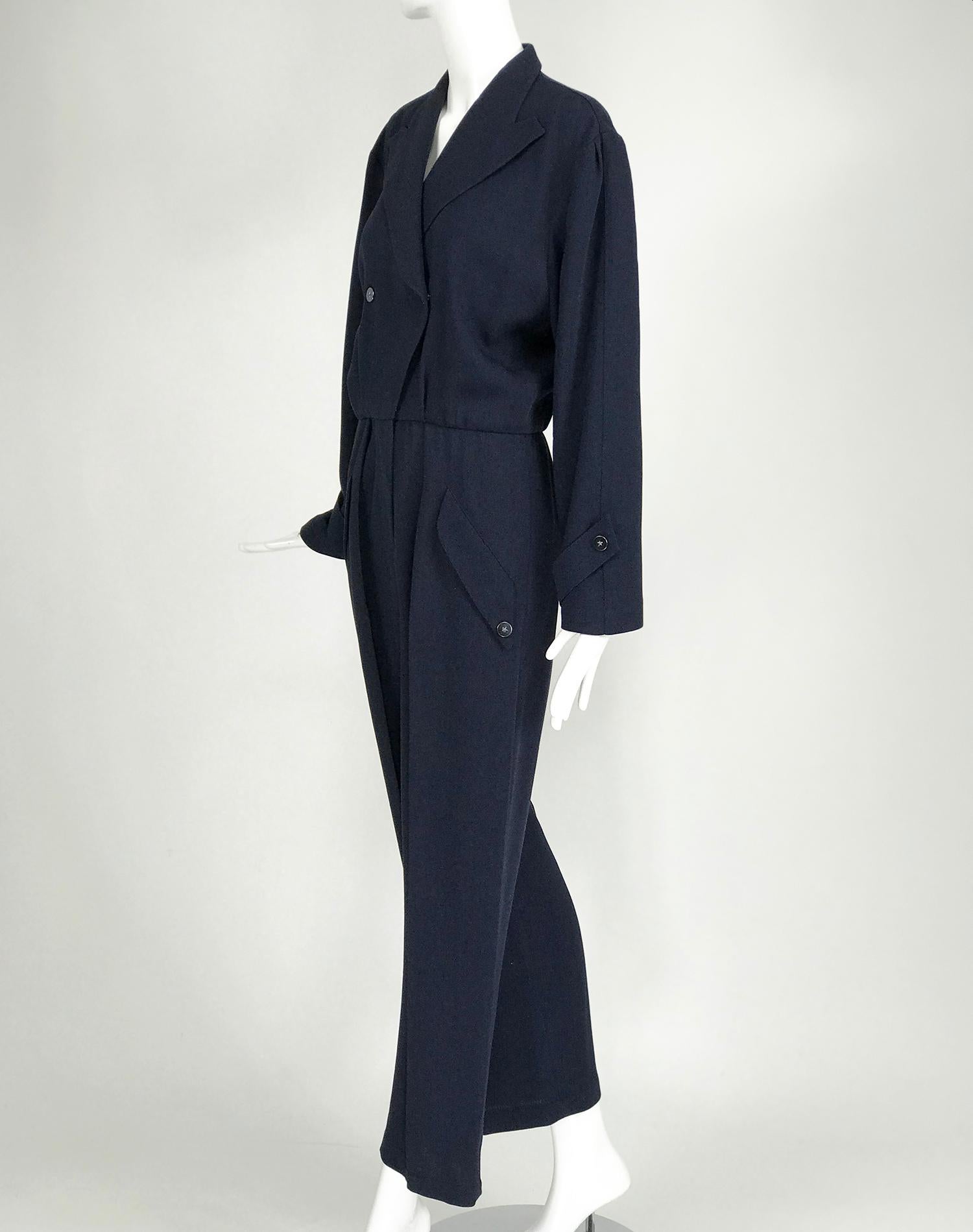 Vintage Thierry Mugler navy blue jumpsuit from the 1980s. An iconic look from the 80s, the jumpsuit was a bit androgynous, a bit neo 80s and a bit sexy Hollywood glam. This version reminds me of Lauren Bacall or Katheryn Hepburn, sort of borrowed