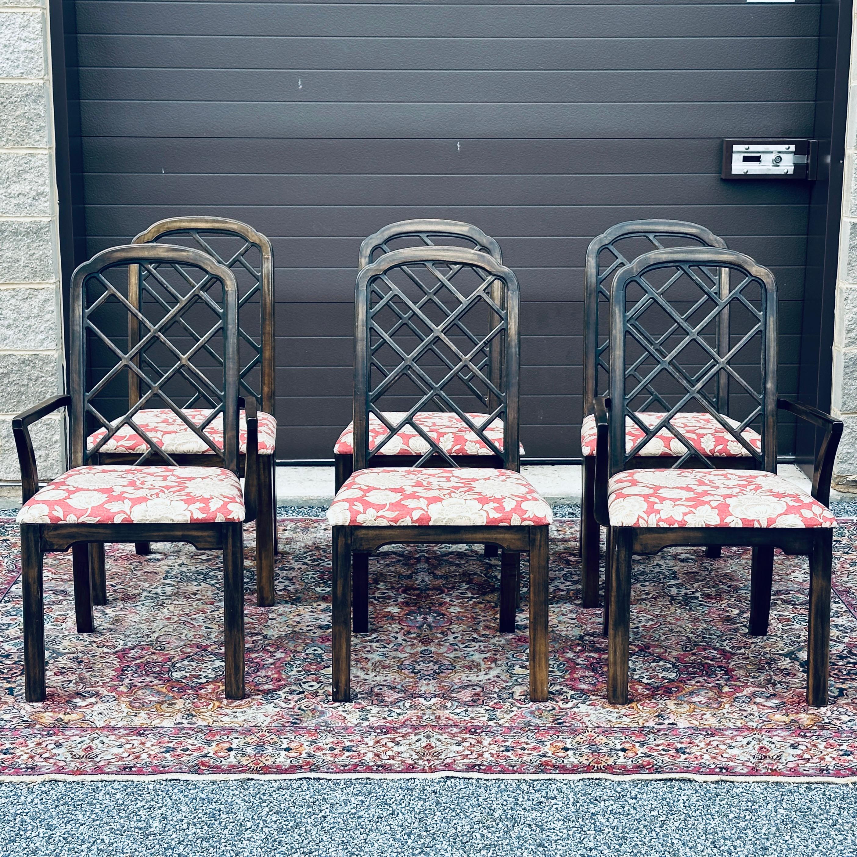 Nice set of vintage Thomasville dining chairs with fretwork back rests and floral upholstered seats. Included are four side chairs and two armchairs.