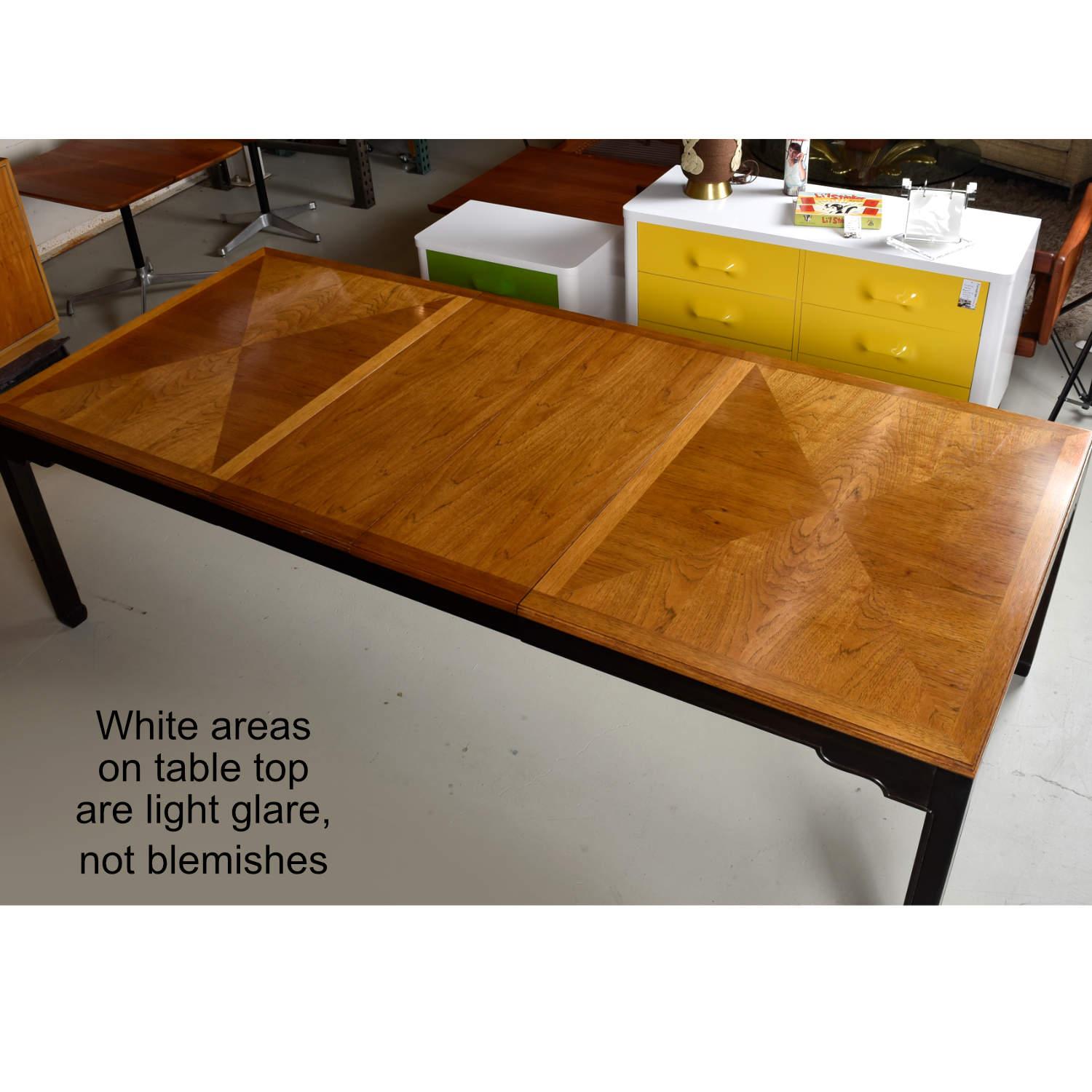 Vintage Thomasville Embassy expanding dining table. The table is 68″ long without leaves, allowing it to host six guests even at it’s most compact size. Two 16″ wide leaves are included. Expand the table to 84″ with one leaf. Add both leaves to