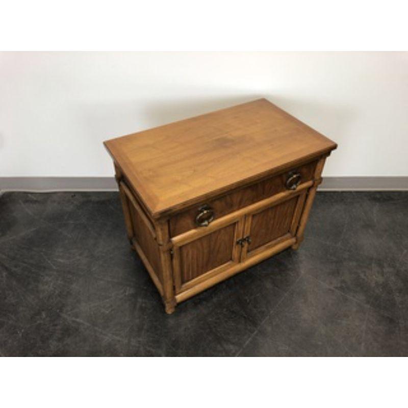 A nightstand by Thomasville from their Stroupe line. Pecan with faux bamboo styling. Made in the USA, in the mid-20th Century. 

Style # L-285-13-NS-65

Measures: 30W 18D 24H

Exceptionally good condition. Few minor signs of wear. Structurally sound